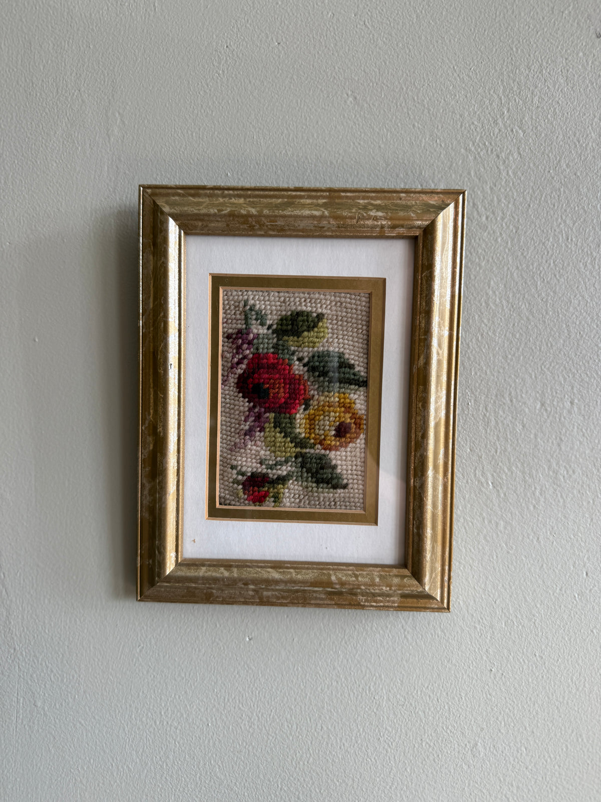 Framed floral needlepoint