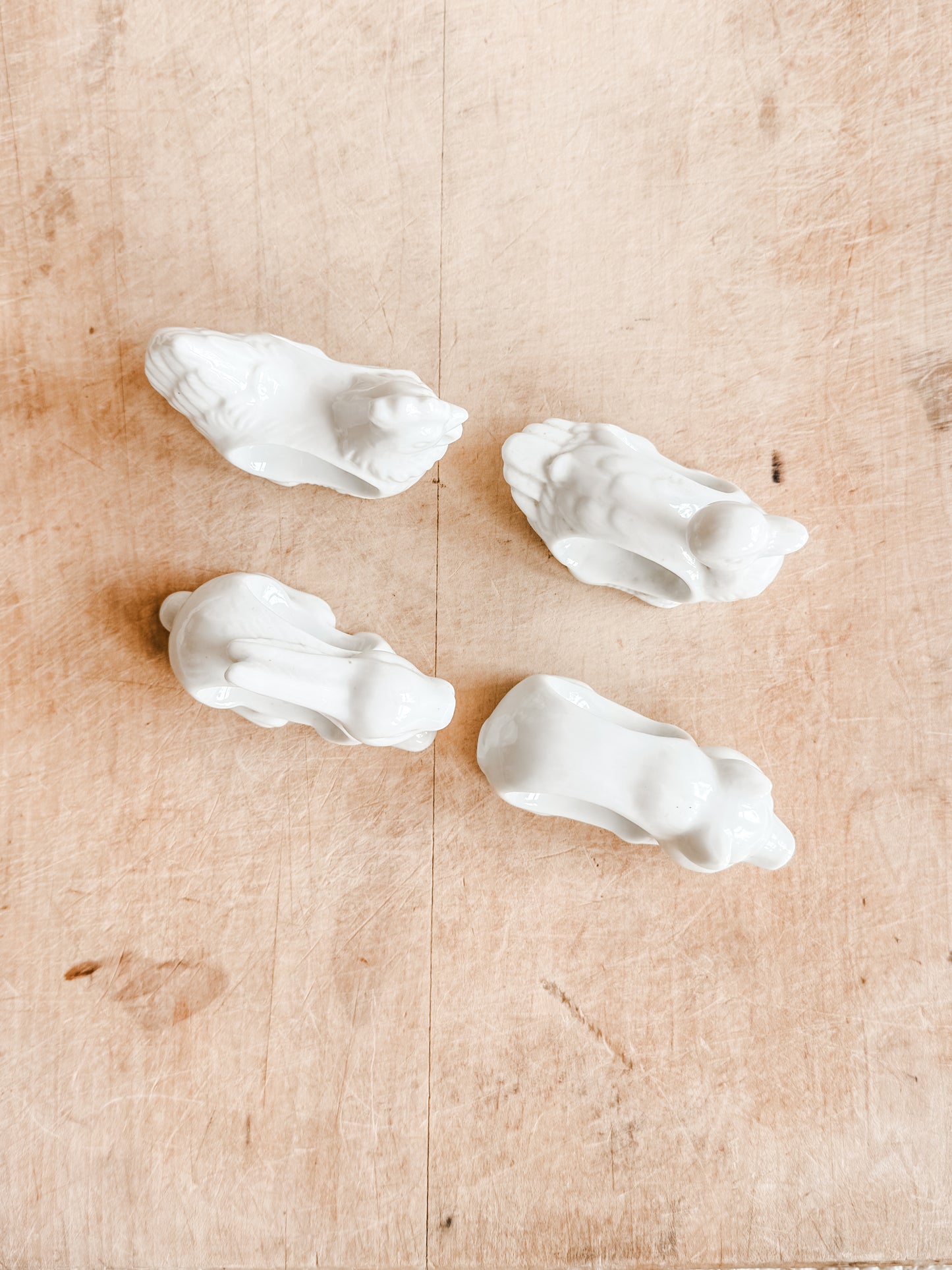 Four White Porcelain Farm Animal Napkin Rings