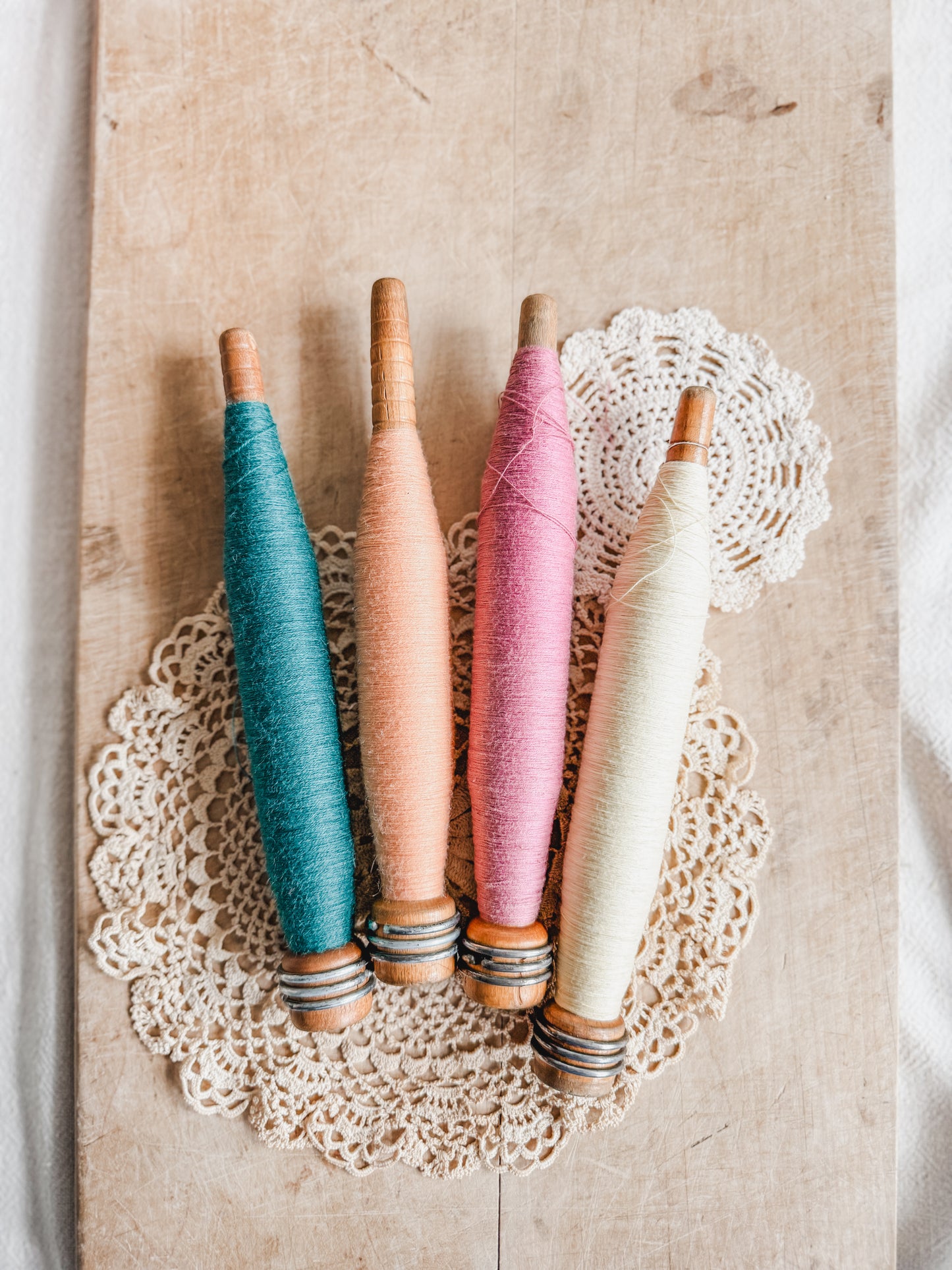 Set of 4 Vintage wooden yarn spindles or bobbins