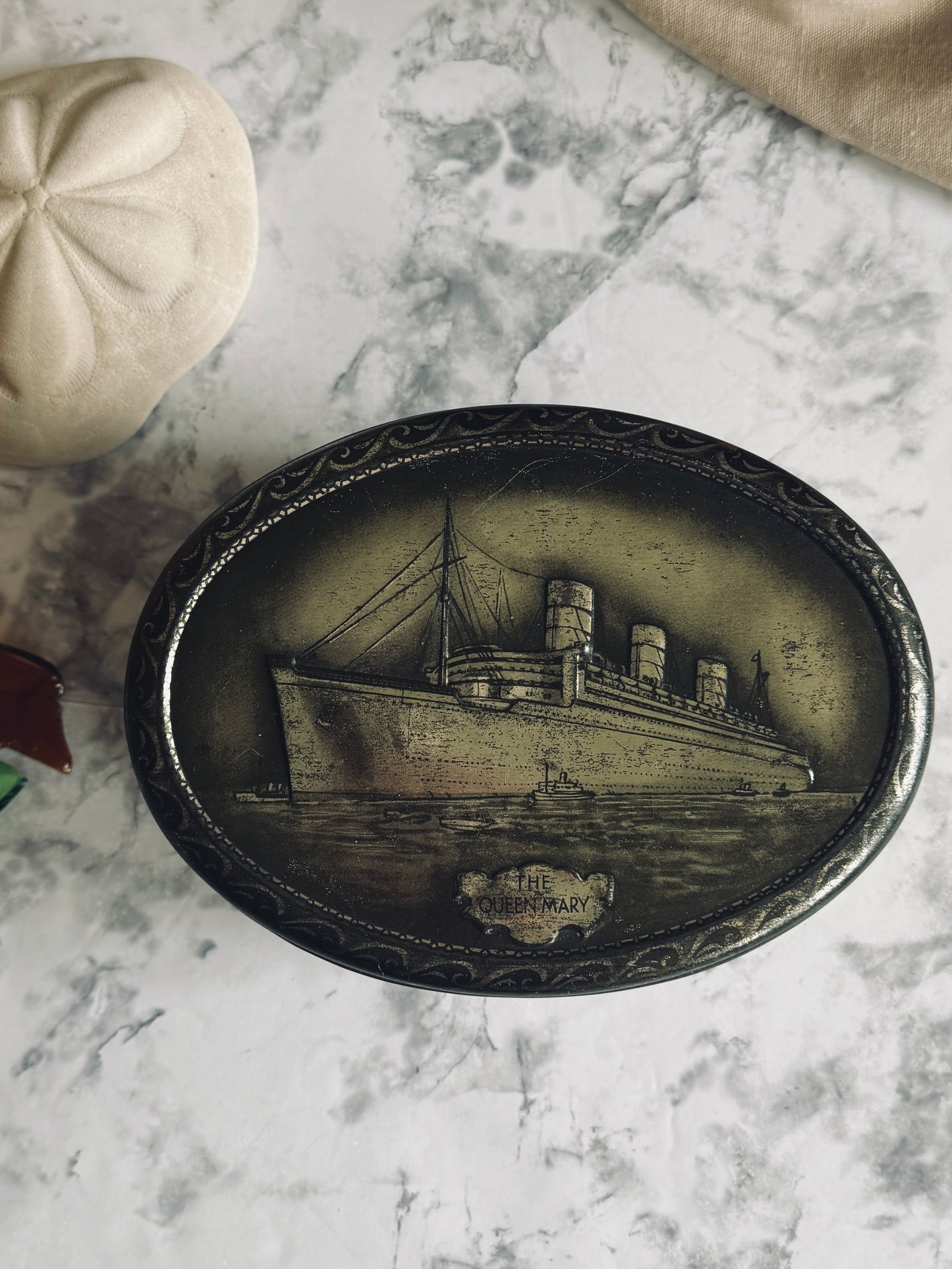 The Queen Mary antique tin