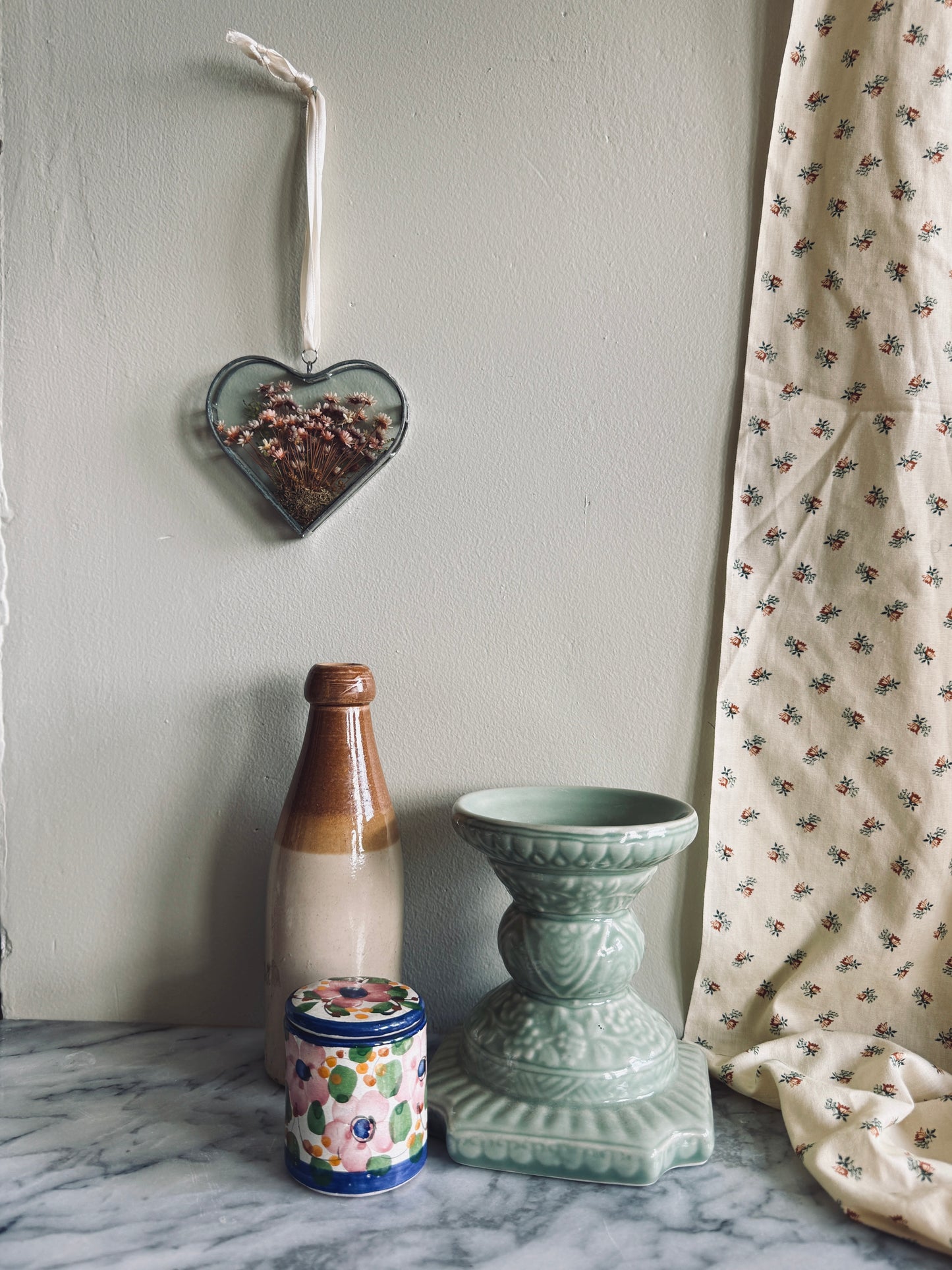 Vintage glass suncatcher with dried floral arrangement