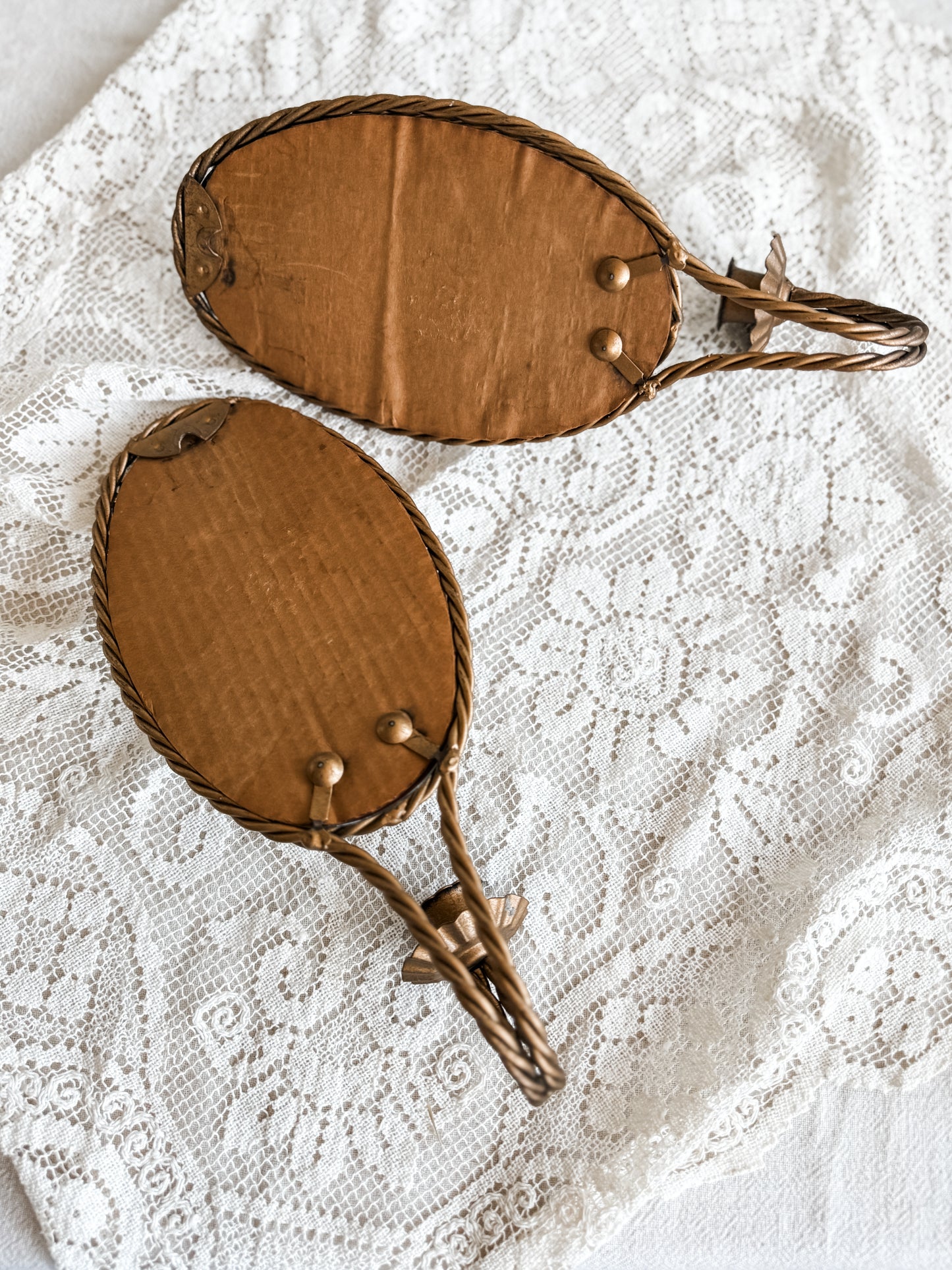 Vintage gold/brass like metal rope mirror wall sconces