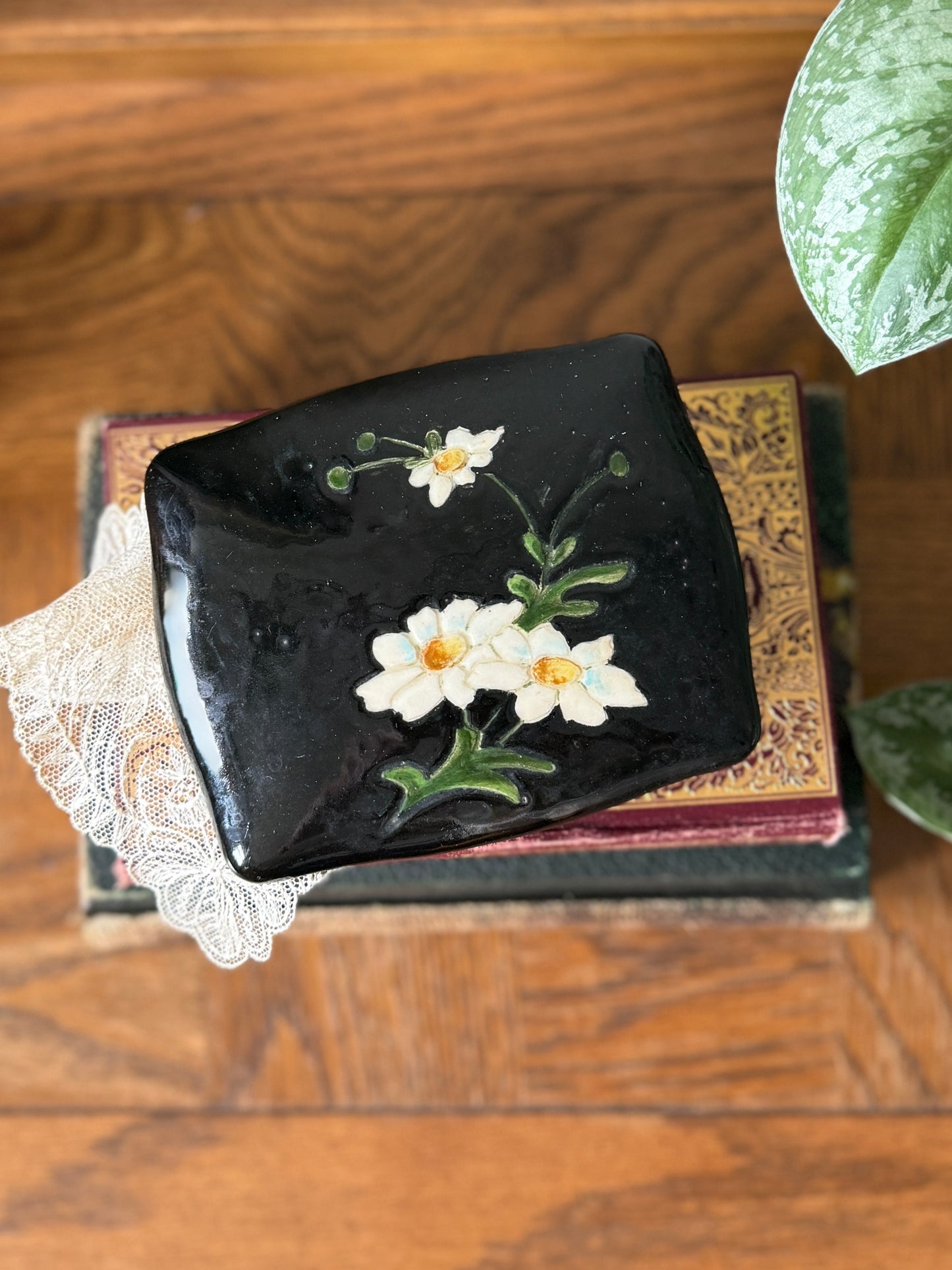 Black handpainted trinket box with daisies