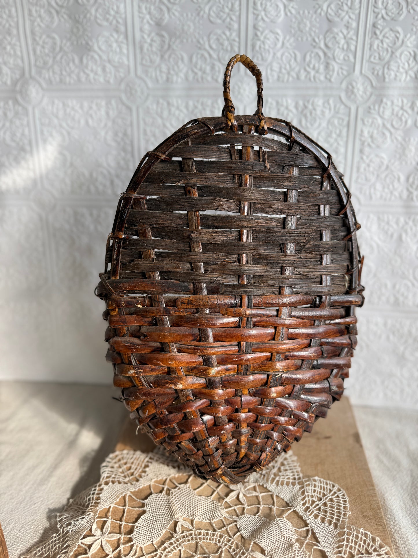 Wicker hanging nesting basket with gourd eggs