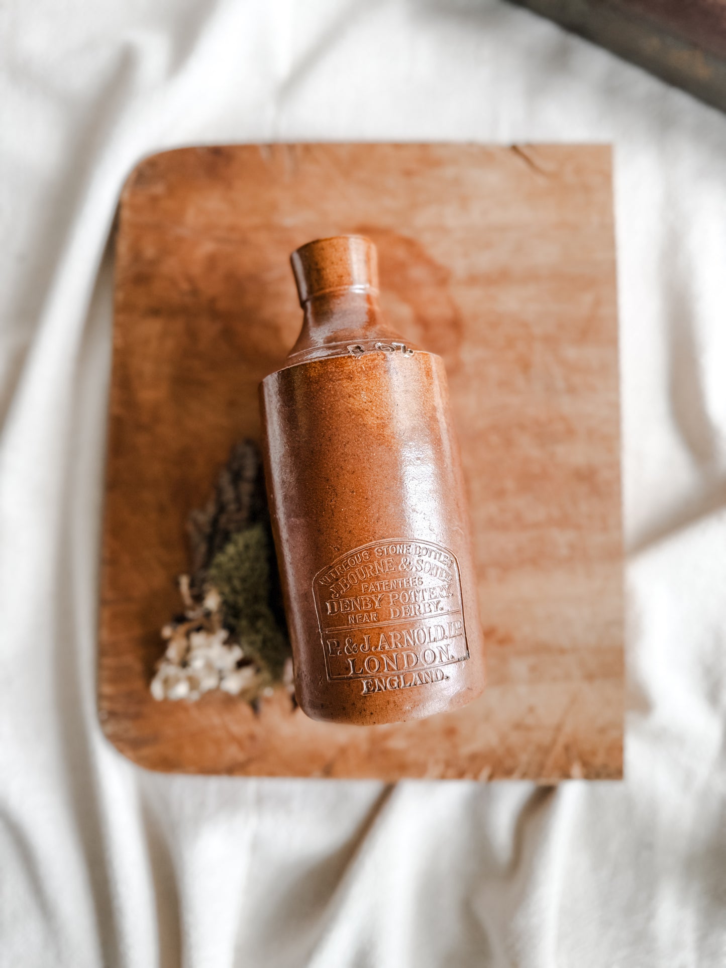 Antique brown stoneware bottle with spout, Antique era 1890-1920’s Marked, P&J Arnold London