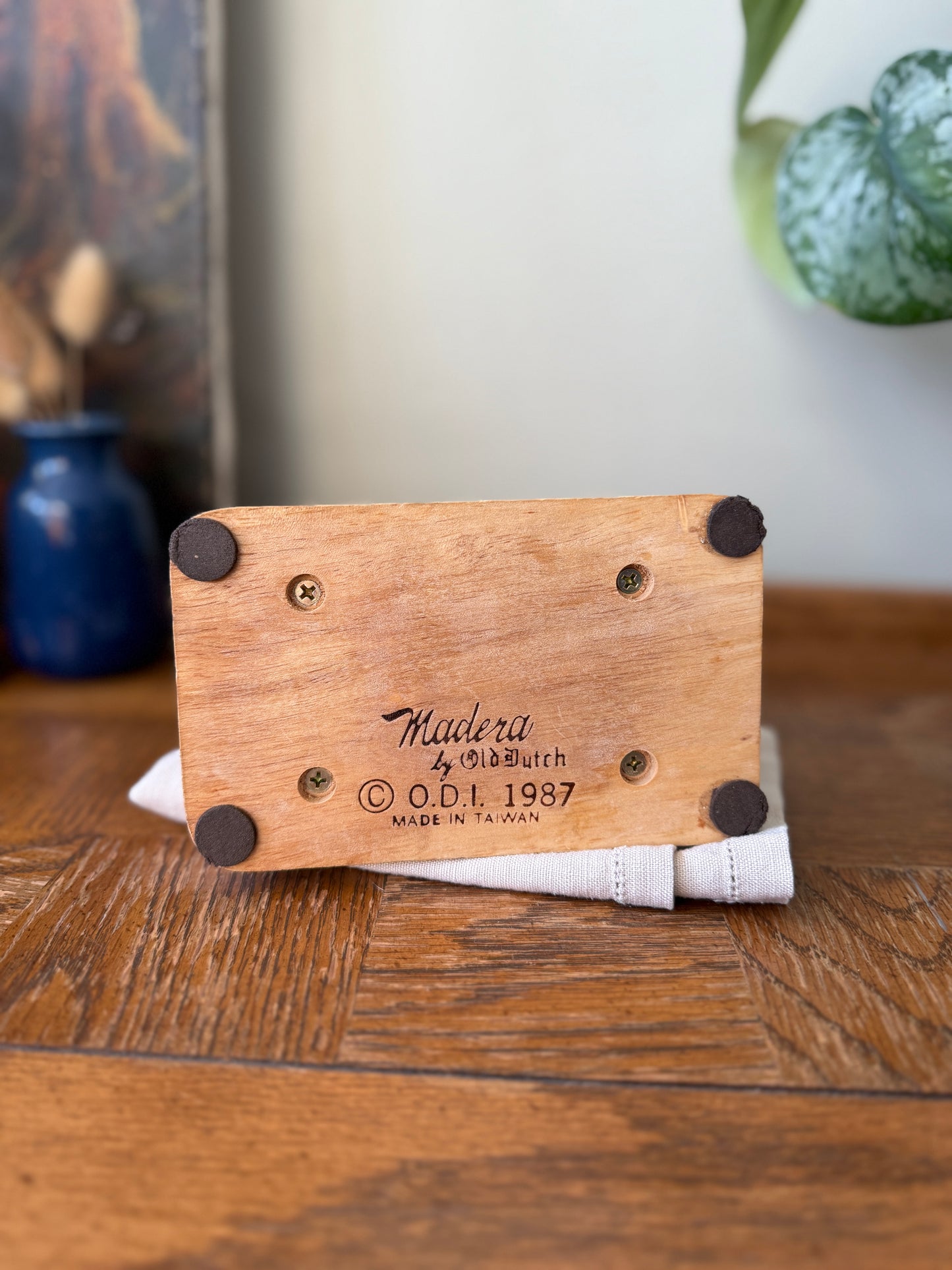 Wooden napkin holder with copper plate