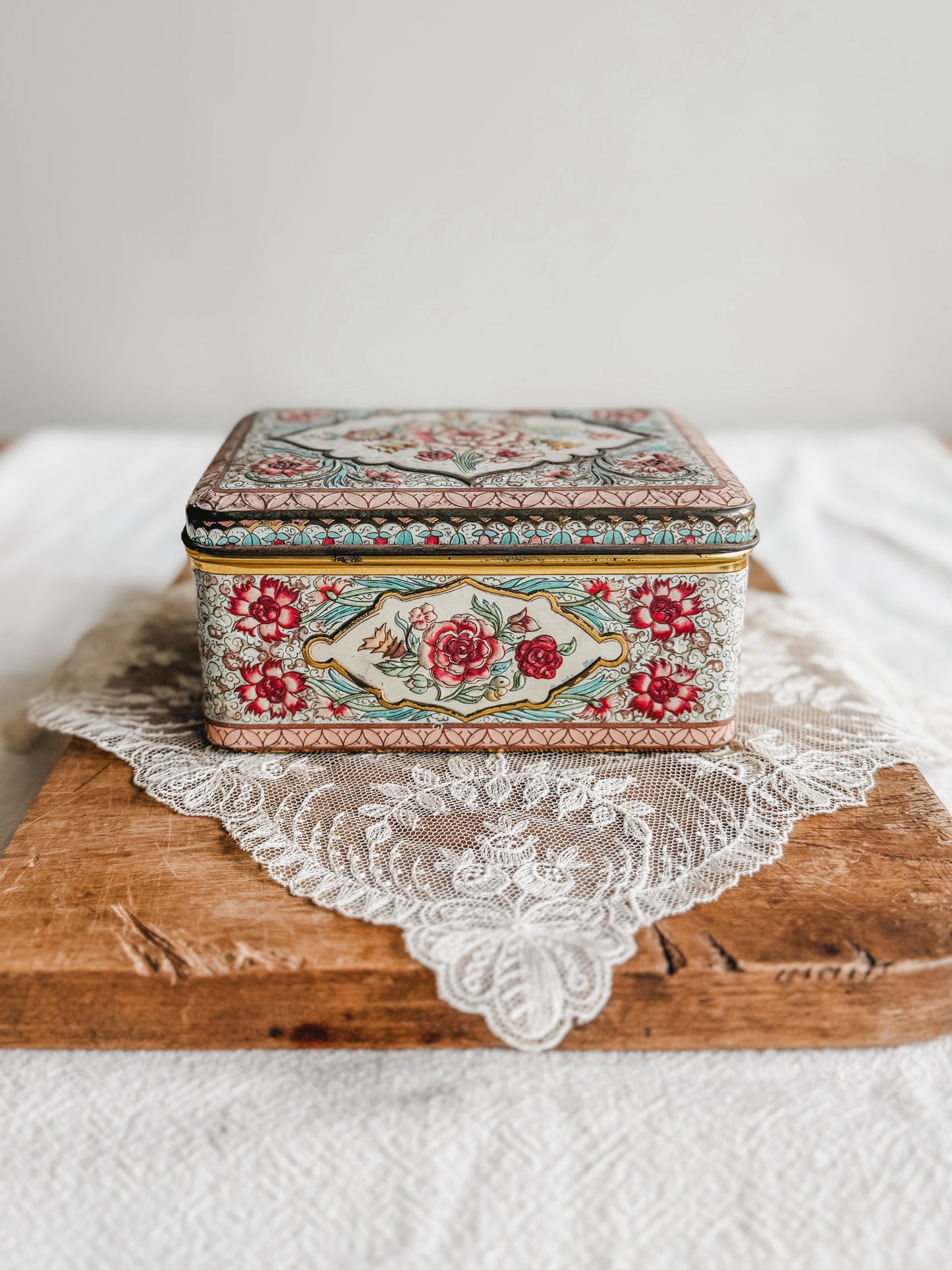 Small floral tin
