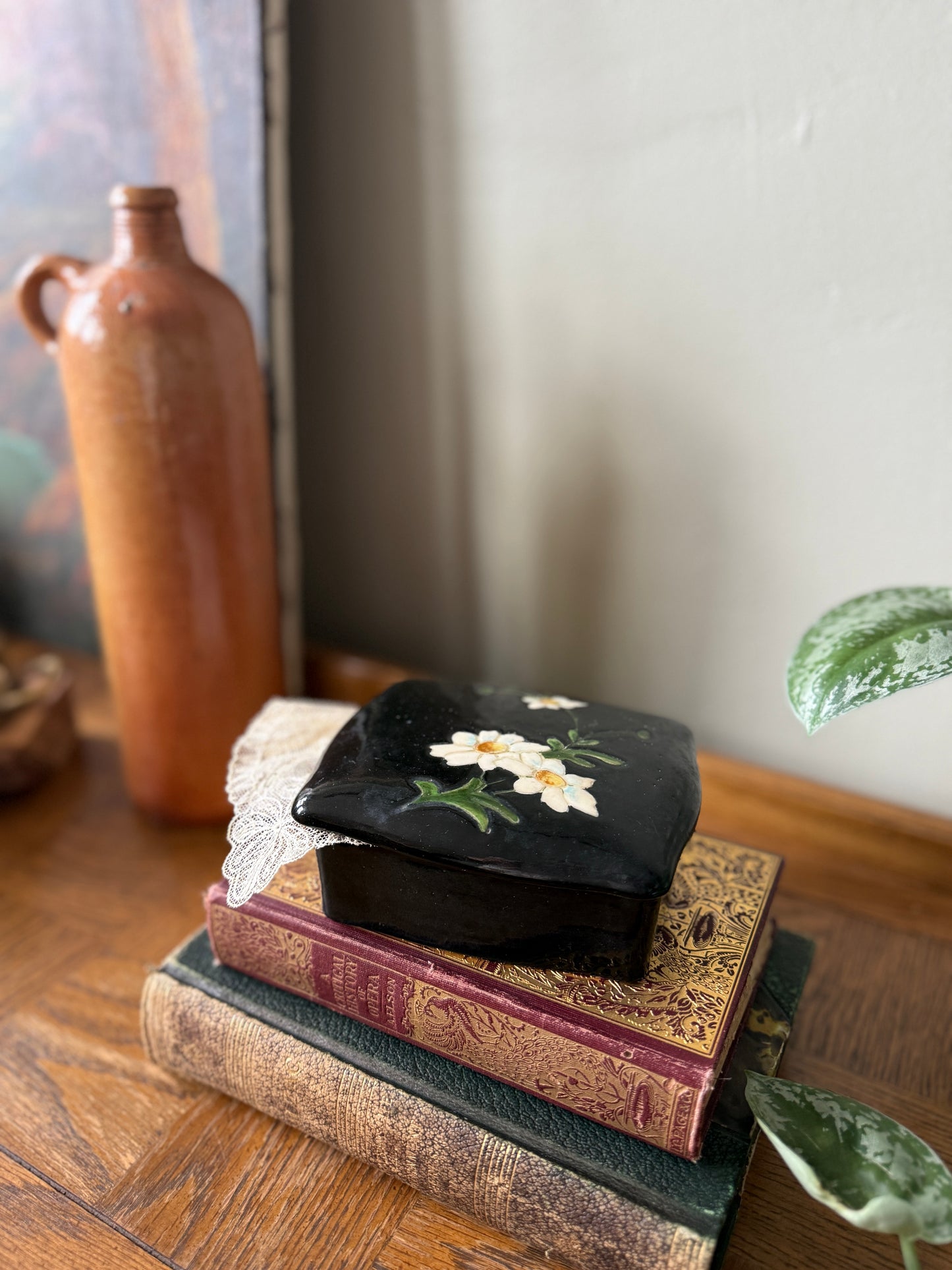 Black handpainted trinket box with daisies