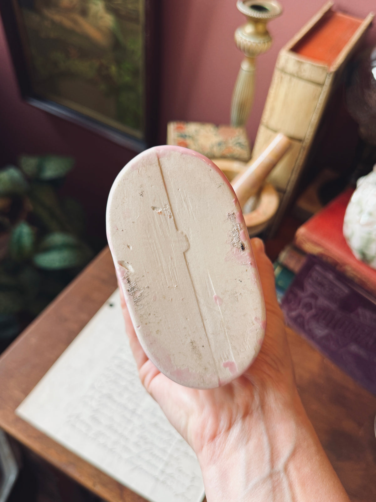 Pink tulip shaped pottery vase with fern frond detail