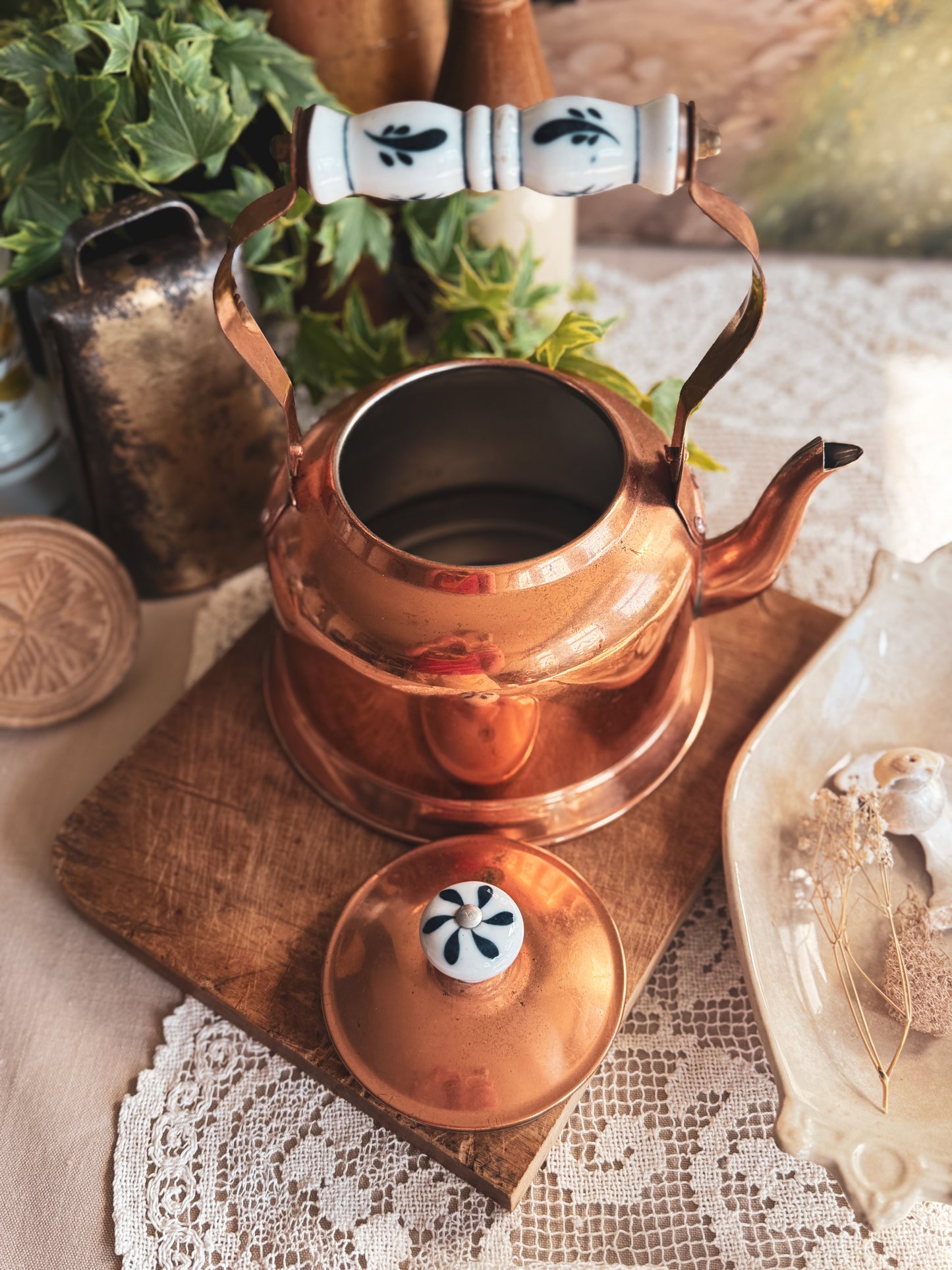 Vintage copper tea pot with delft style porcelain blue and white handle