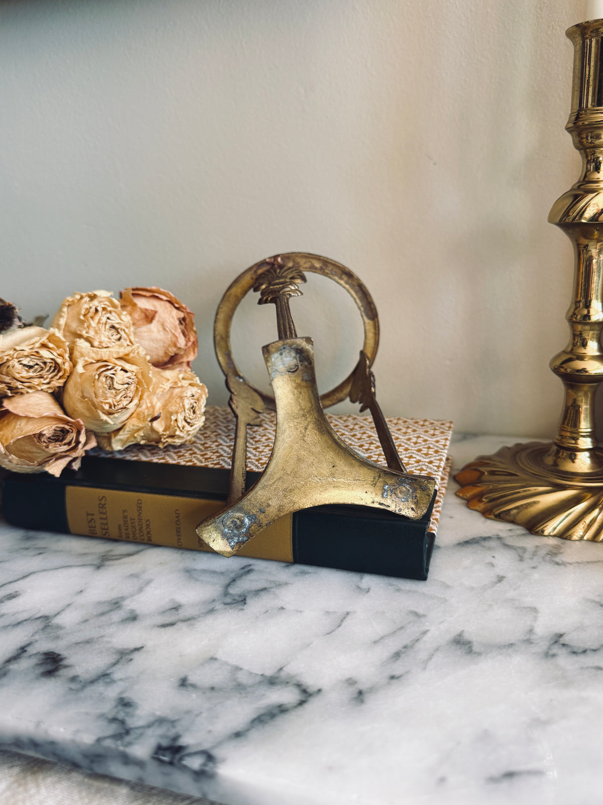 Crackle glass vase in Hollywood regency style brass holder