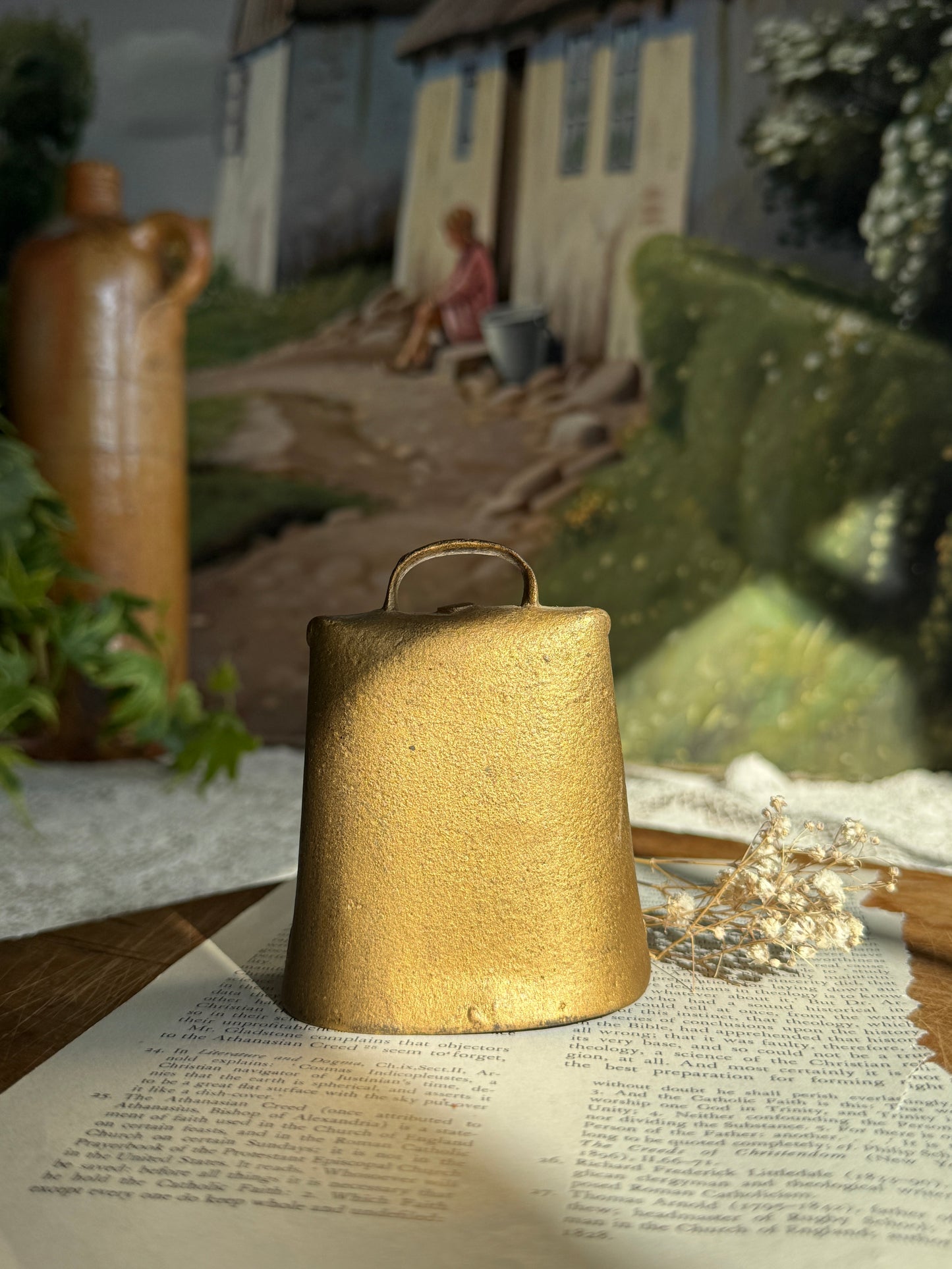 Rustic golden toned cow brass bell