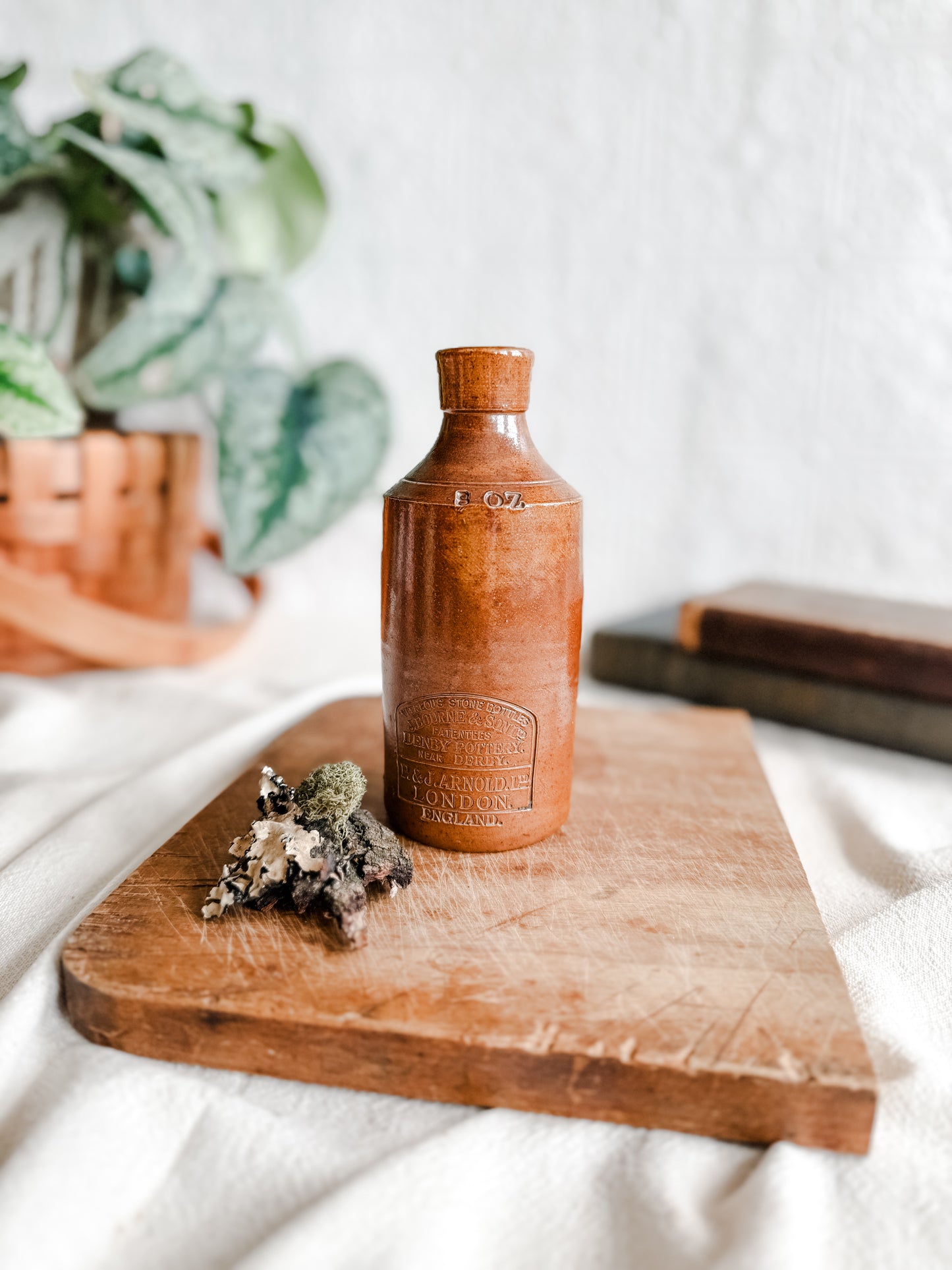 Antique brown stoneware bottle with spout, Antique era 1890-1920’s Marked, P&J Arnold London