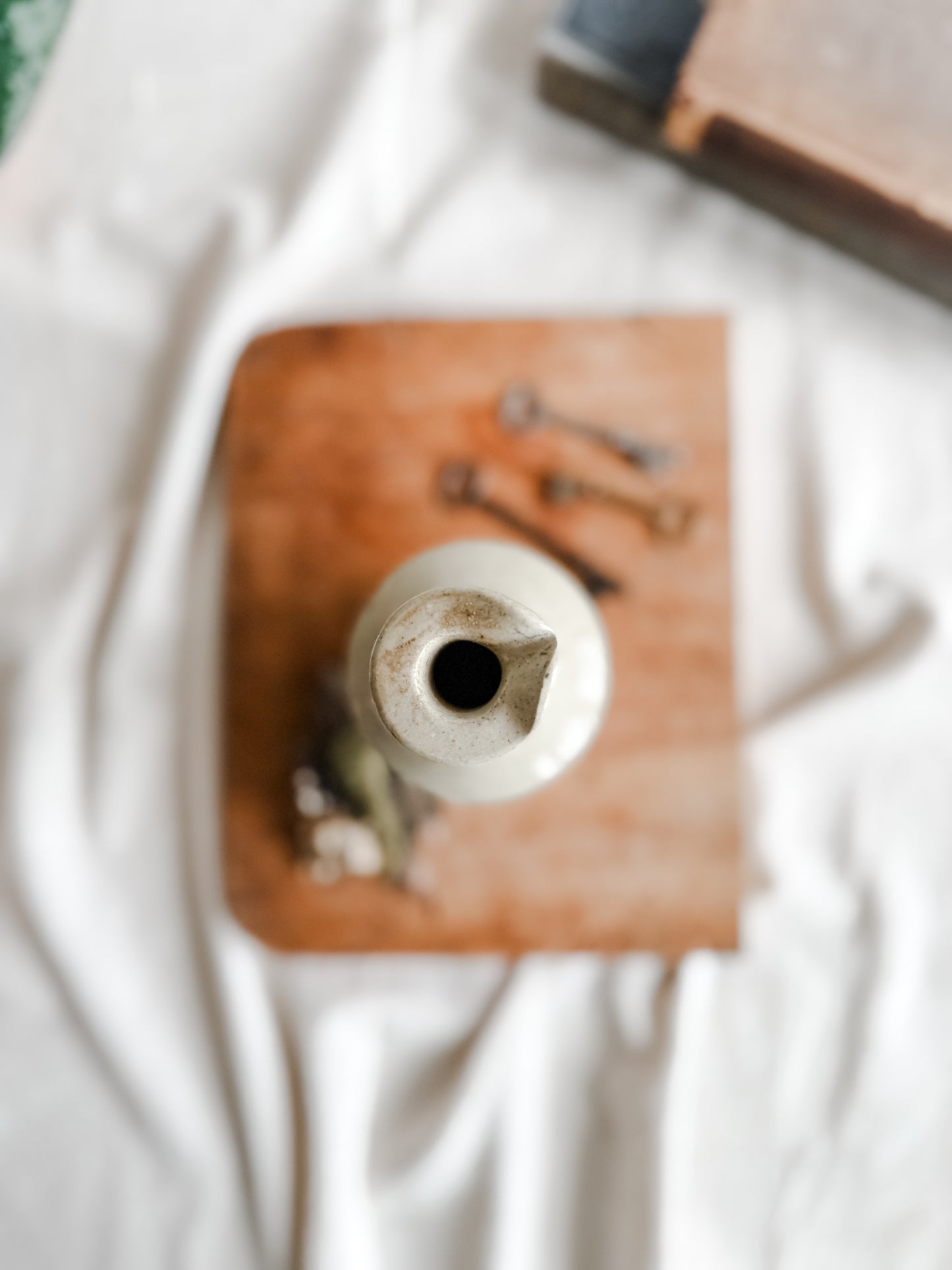 Creamy colored Stoneware Ink Pour Bottle, Early 1900’s, Marked with a rare sword logo