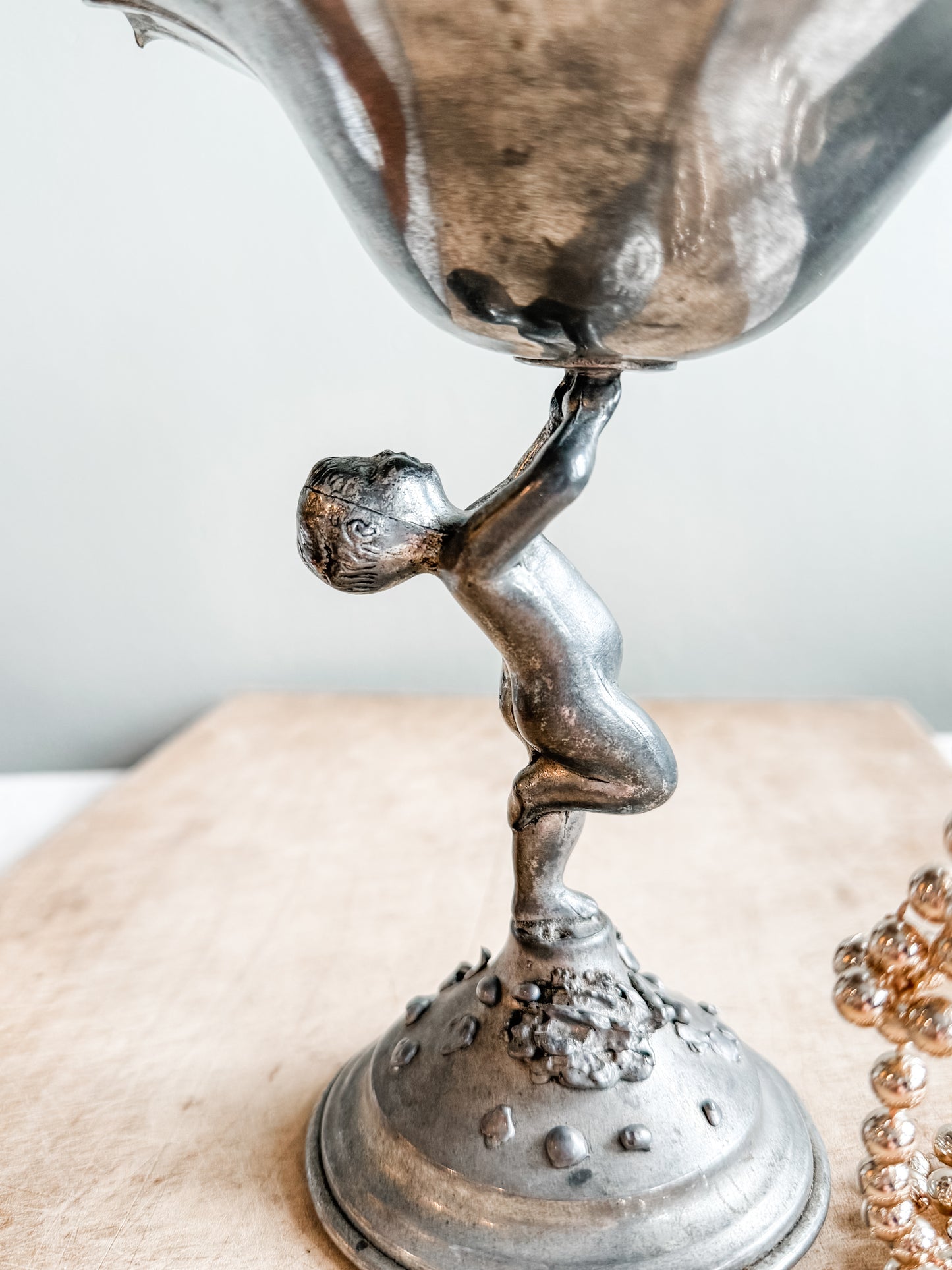 Pewter Cherub Holding a Flower Compote