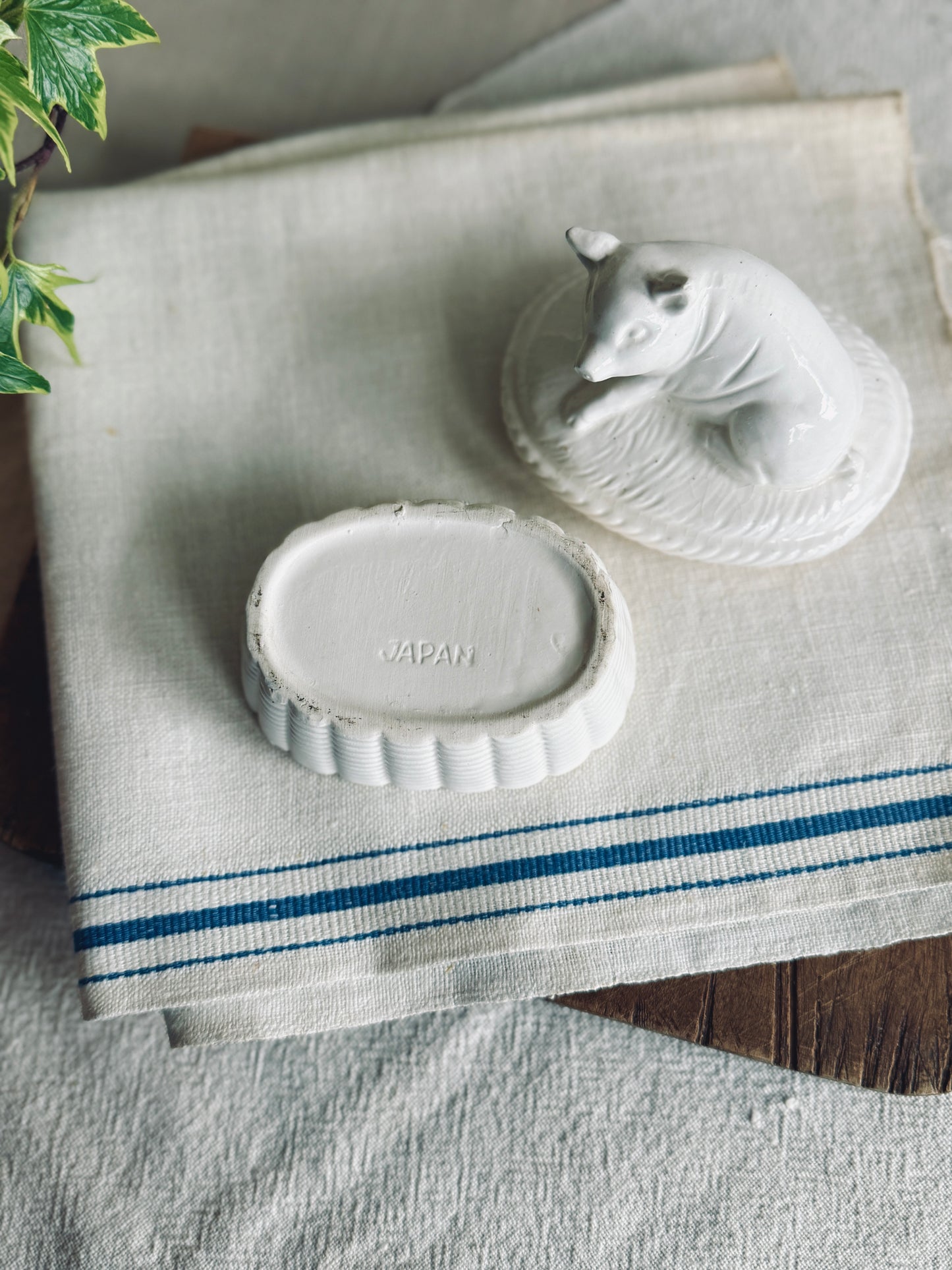 Vintage White ceramic pig on nest