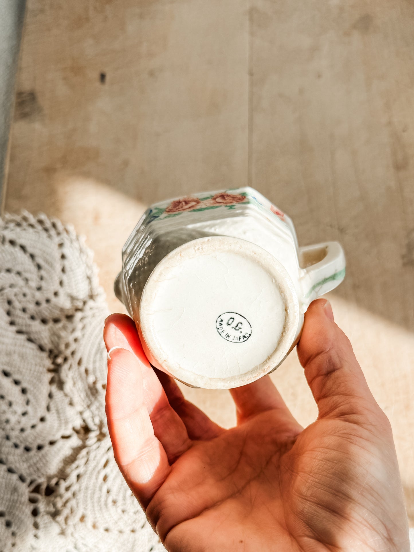 Small floral pitcher with green border