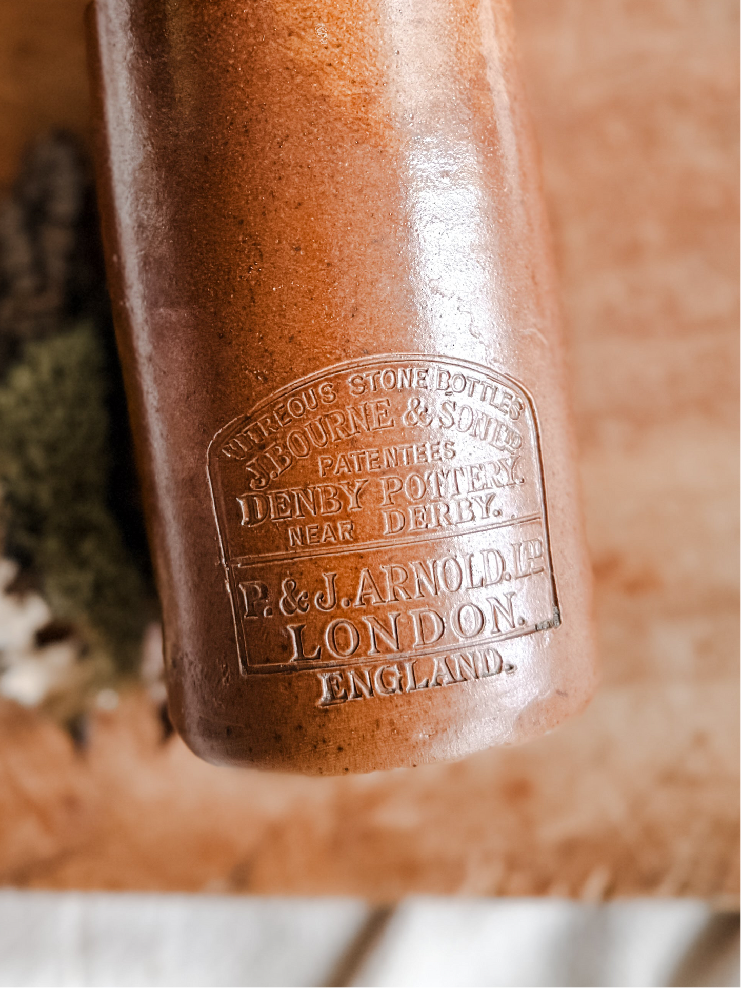 Antique brown stoneware bottle with spout, Antique era 1890-1920’s Marked, P&J Arnold London