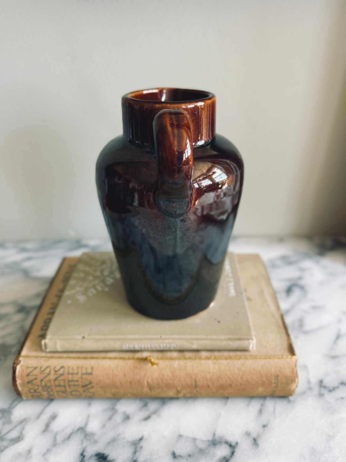 Brown glazed crock pitcher
