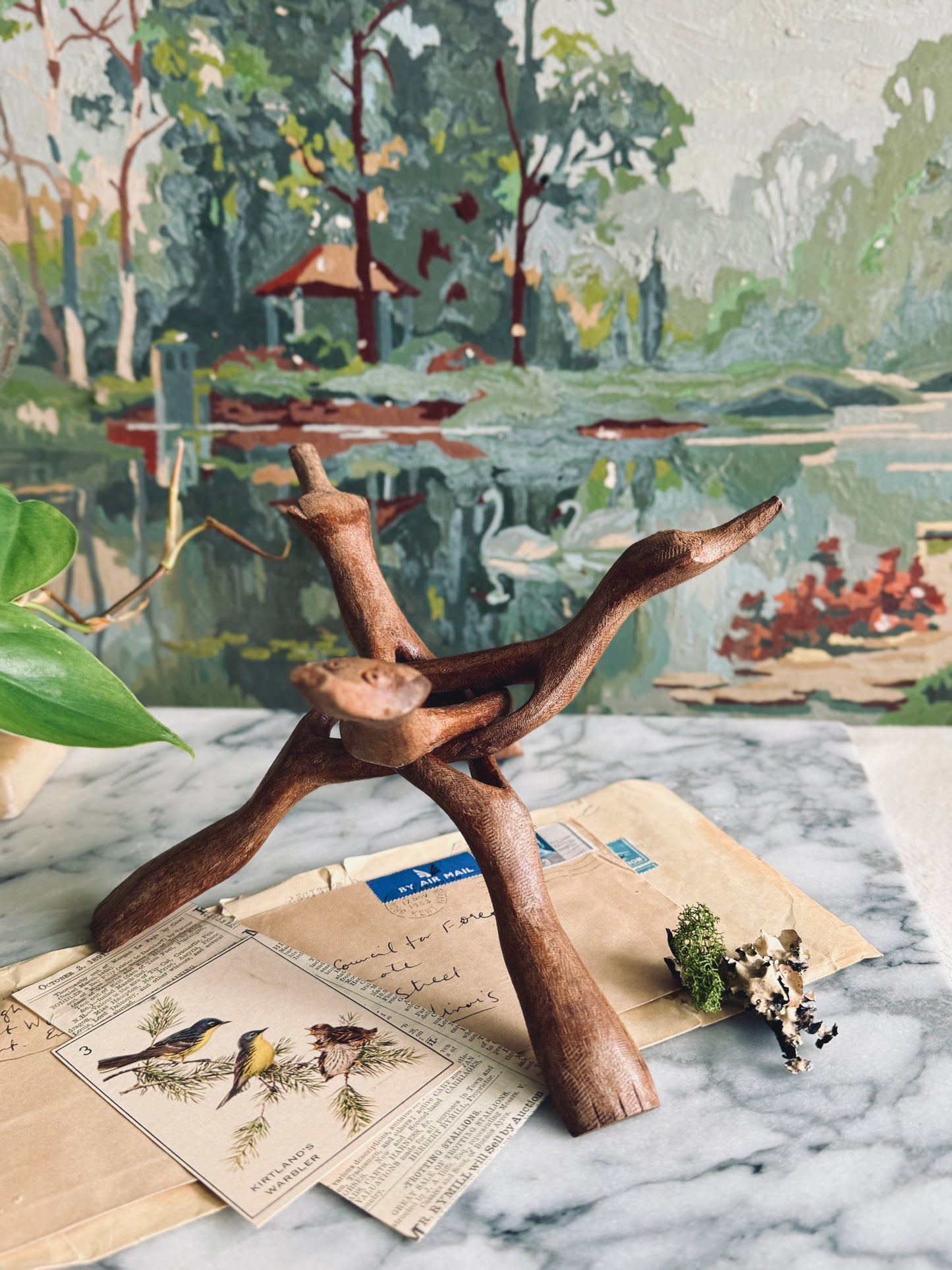 Large hand carved tripod