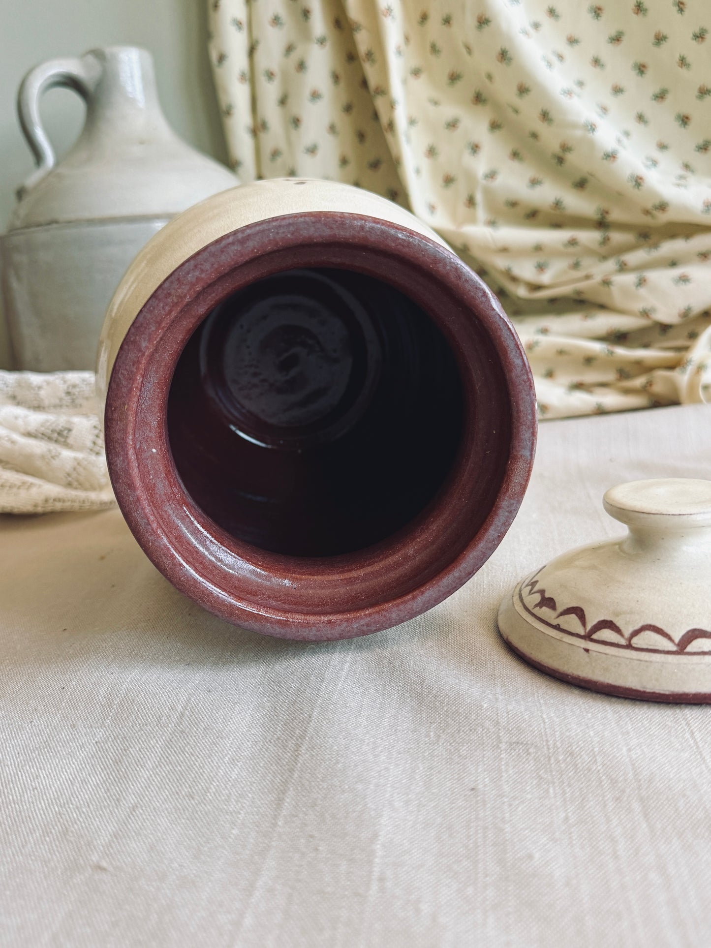 Pottery cookie jar with floral design