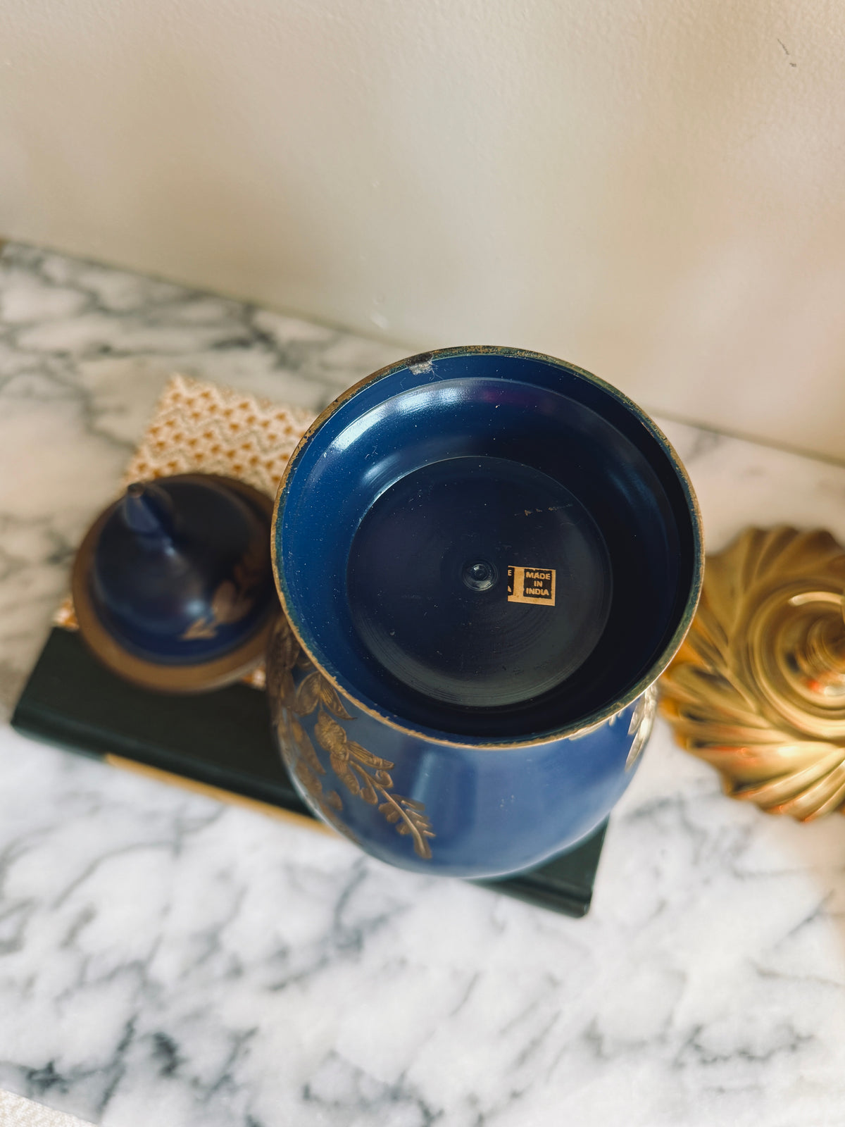 Brass and navy blue enameled urn