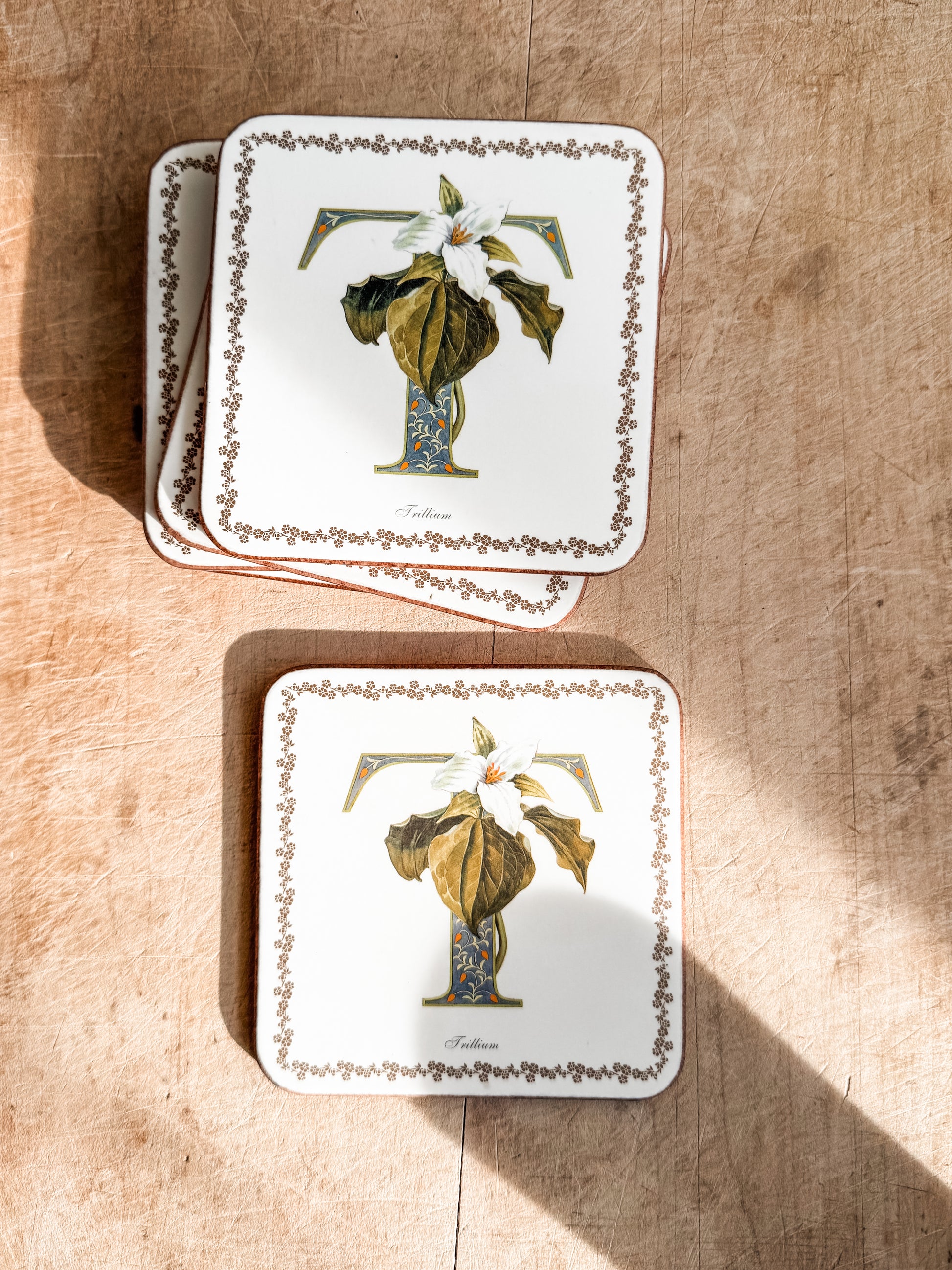 Vintage coasters with the letter T  