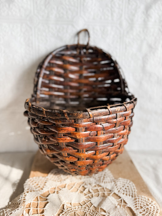 Wicker hanging nesting basket with gourd eggs