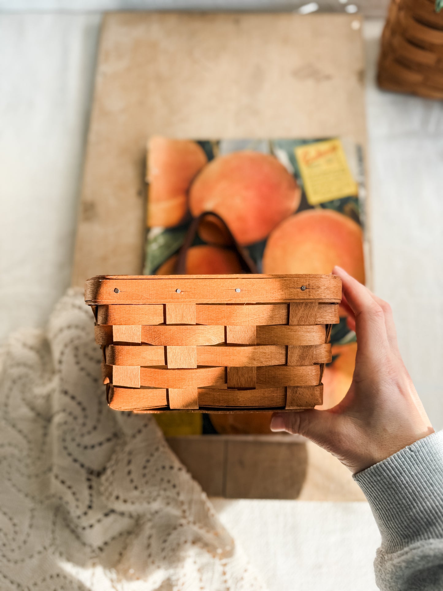 Small vintage Longaberger woven basket with leather handle and wall hanger