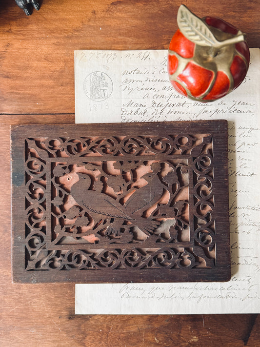 Wooden carved relief panel with birds