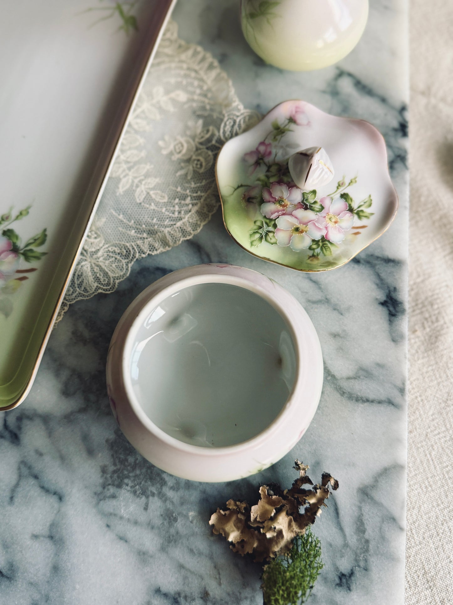 Four piece hand painted Nippon vanity set