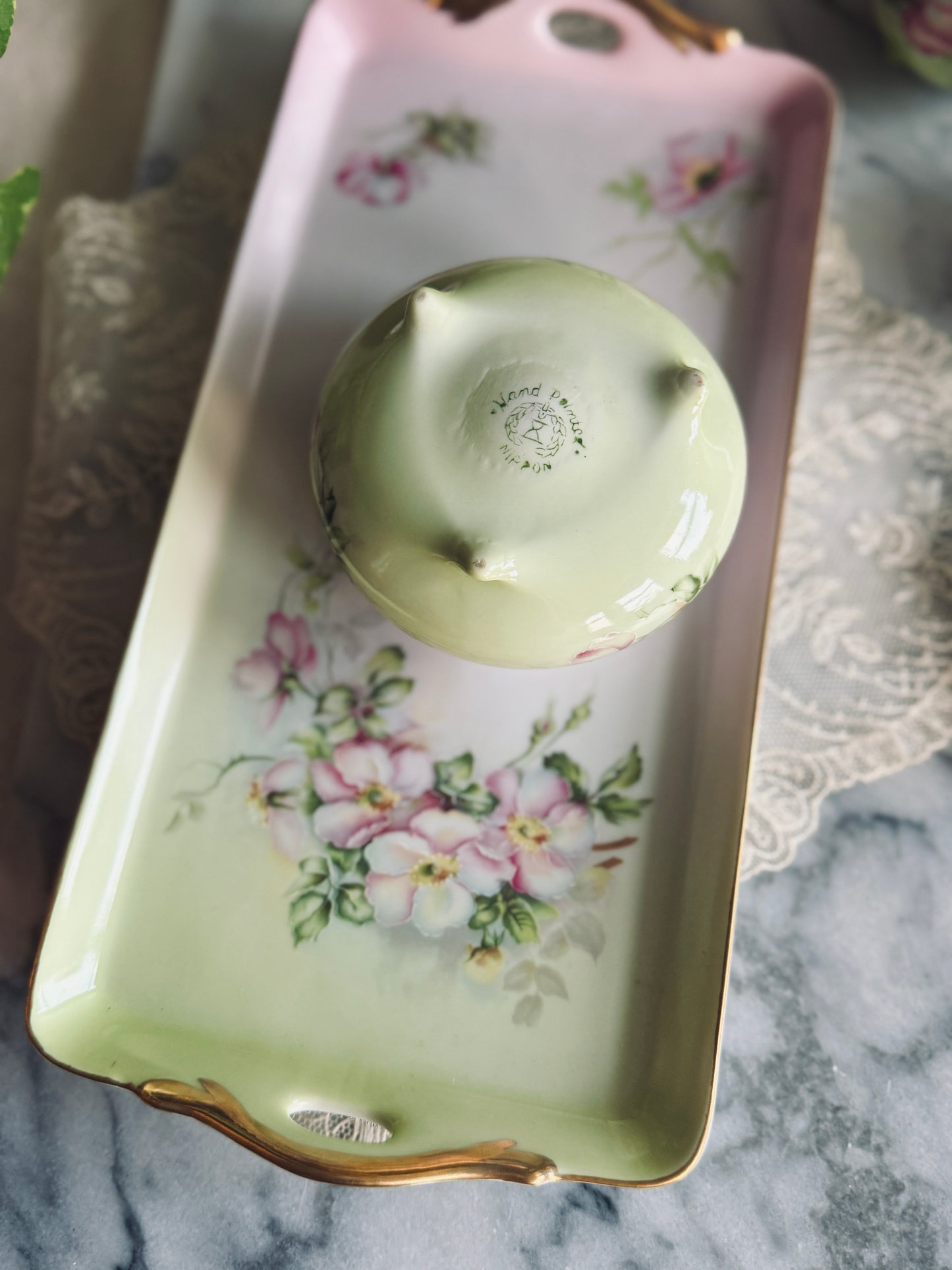 Four piece hand painted Nippon vanity set