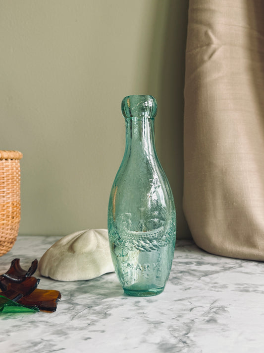 Antique aqua glass Torpedo bottle