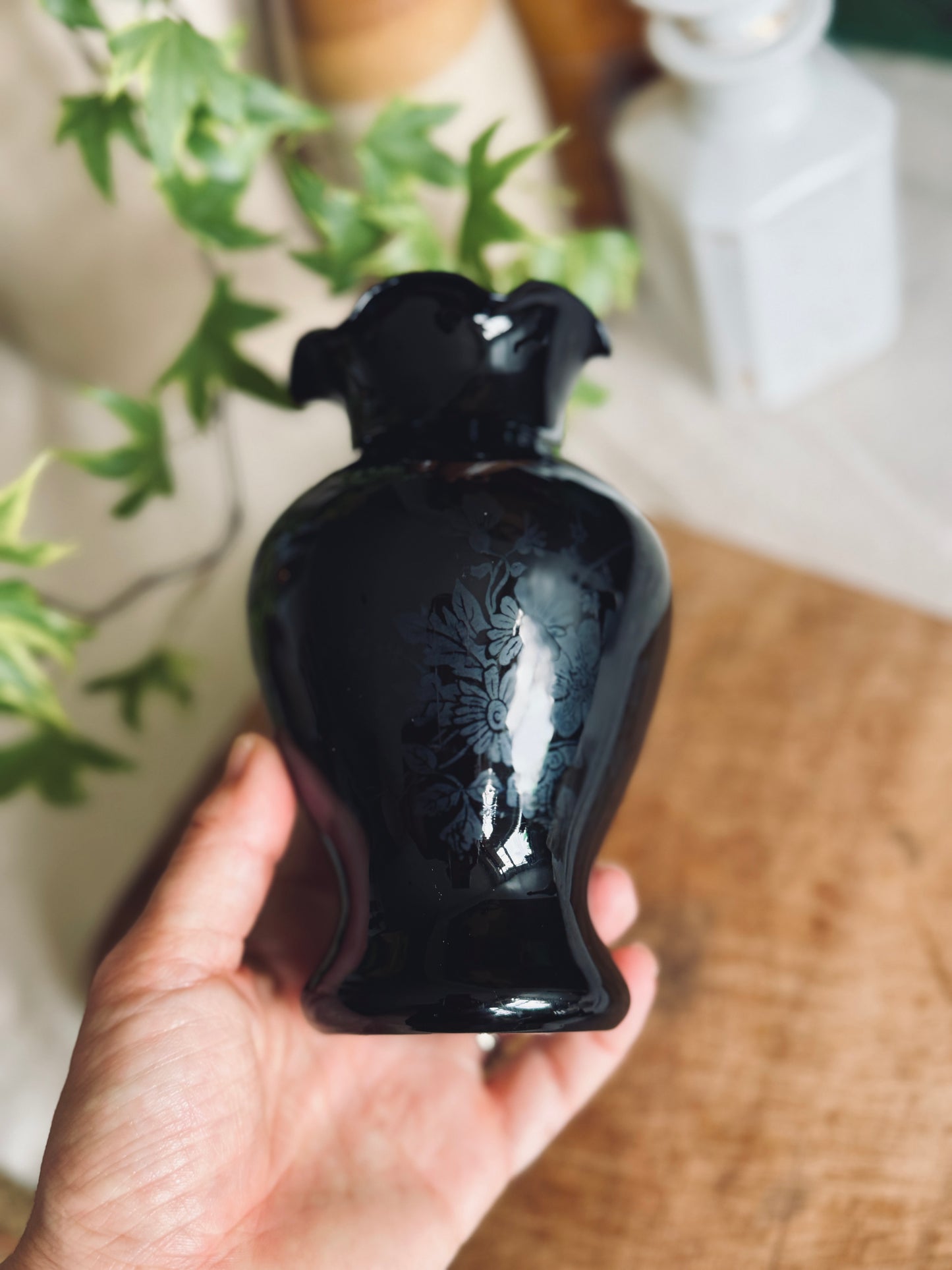 Vintage black amethyst ruffled vase with floral design