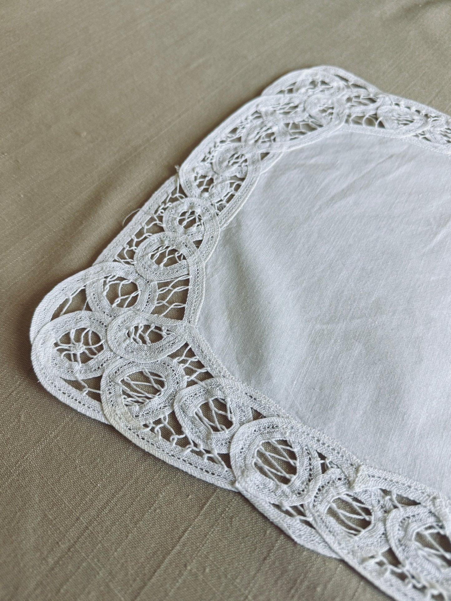 White vintage linen with lace border