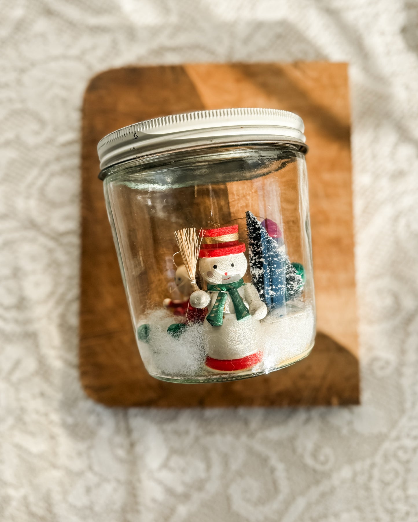 Vintage jar with handmade snowy scene