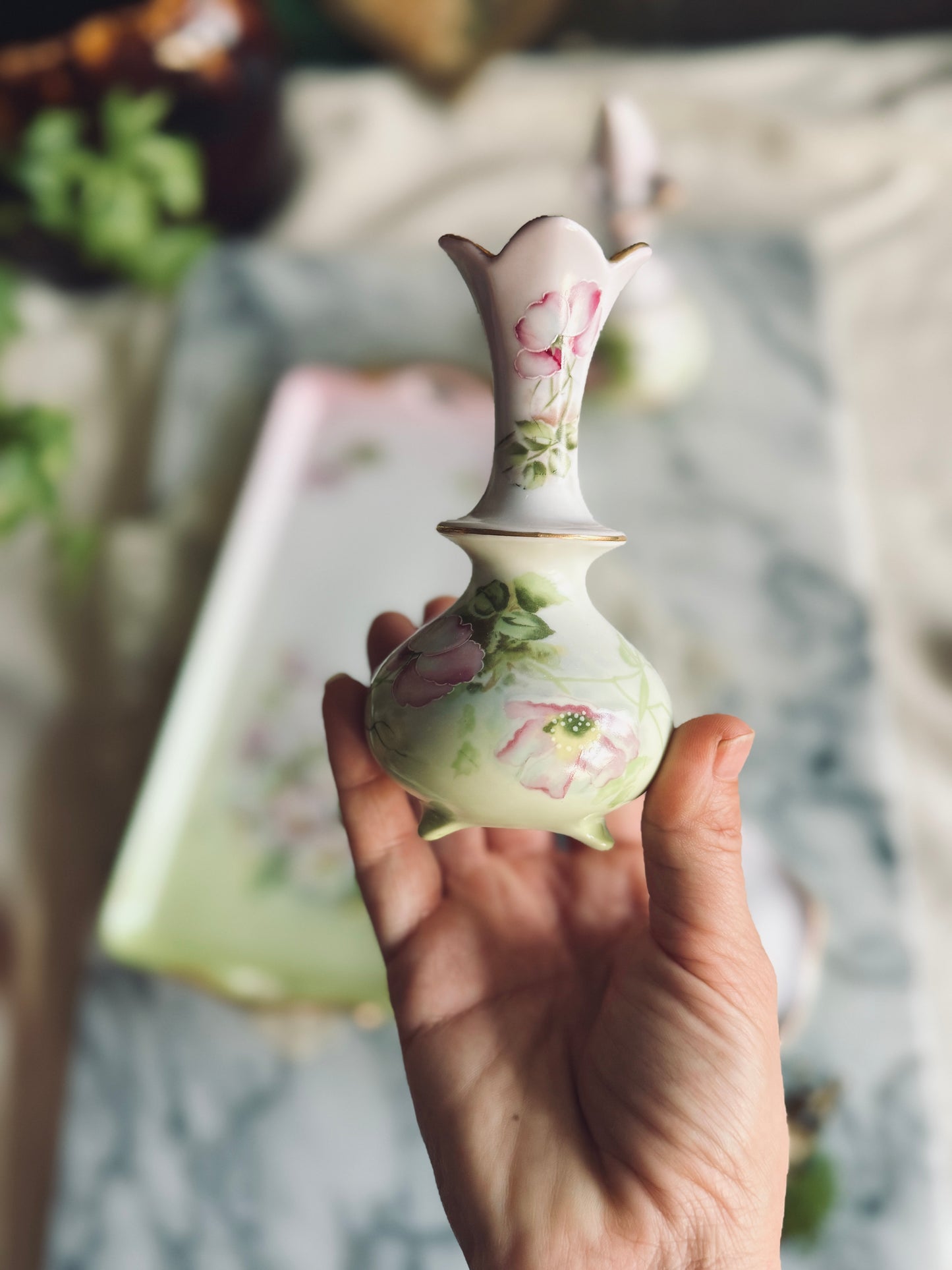 Four piece hand painted Nippon vanity set
