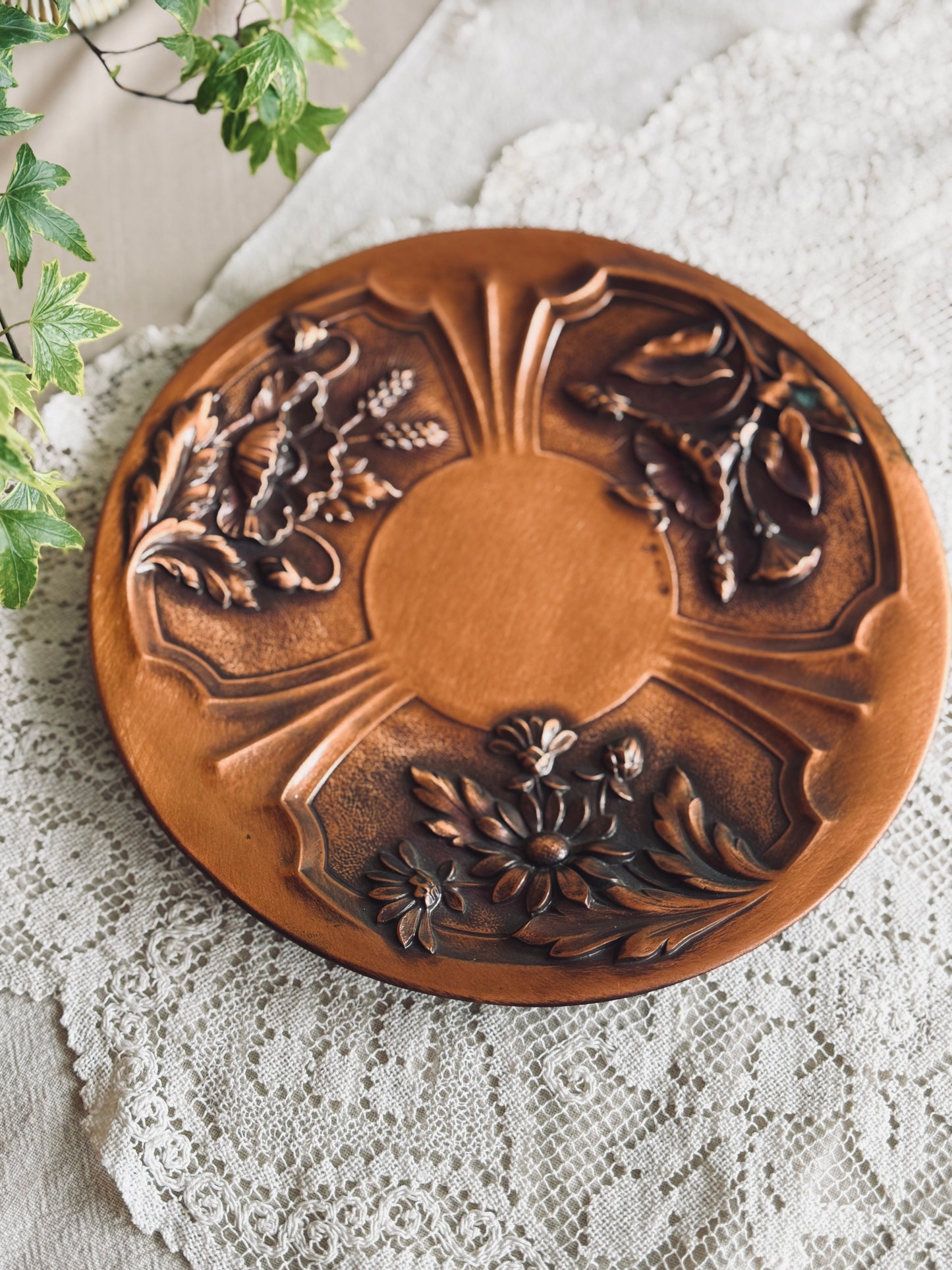 Large copper wall art with embossed florals