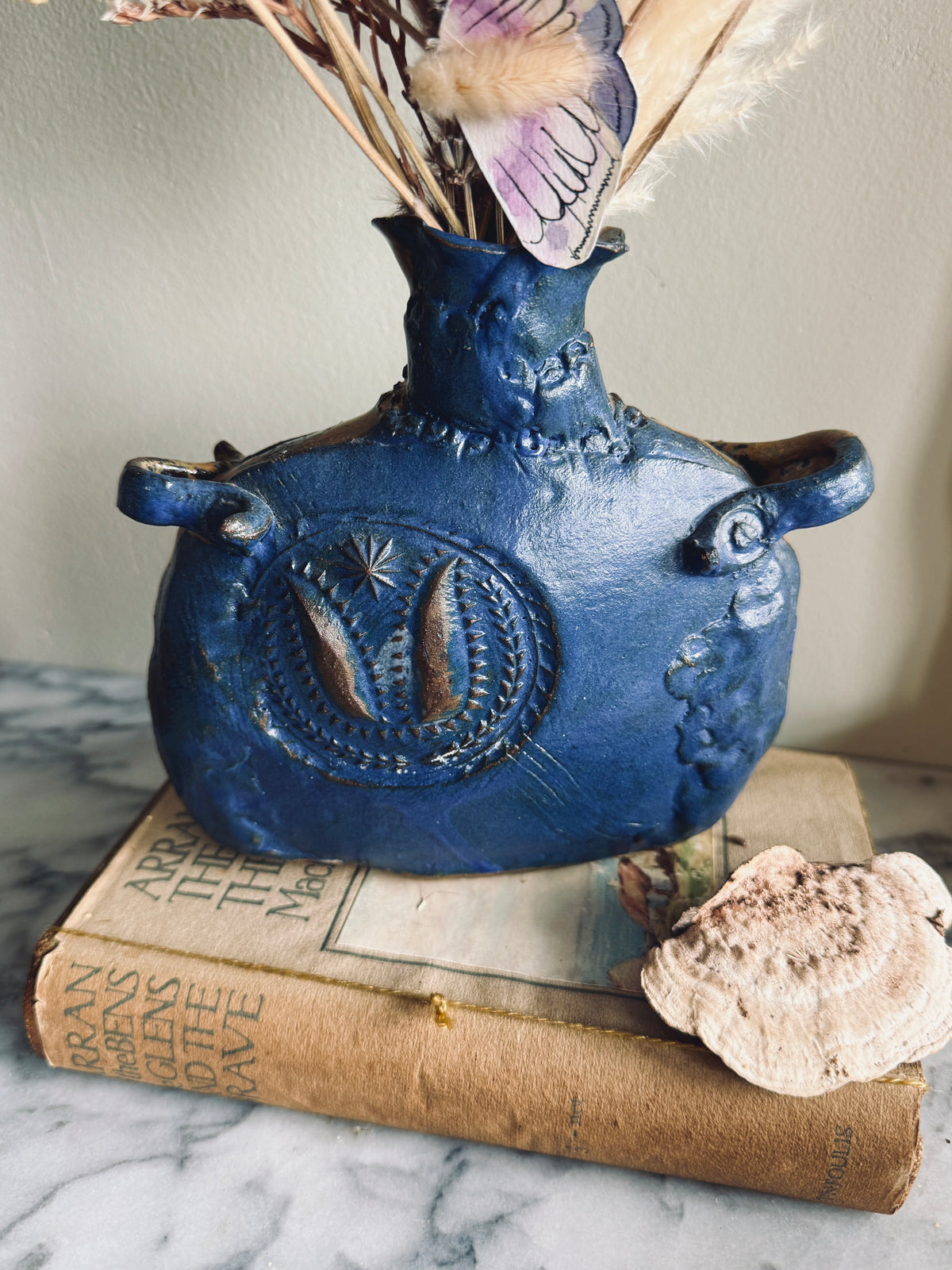 Studio pottery vase with handles