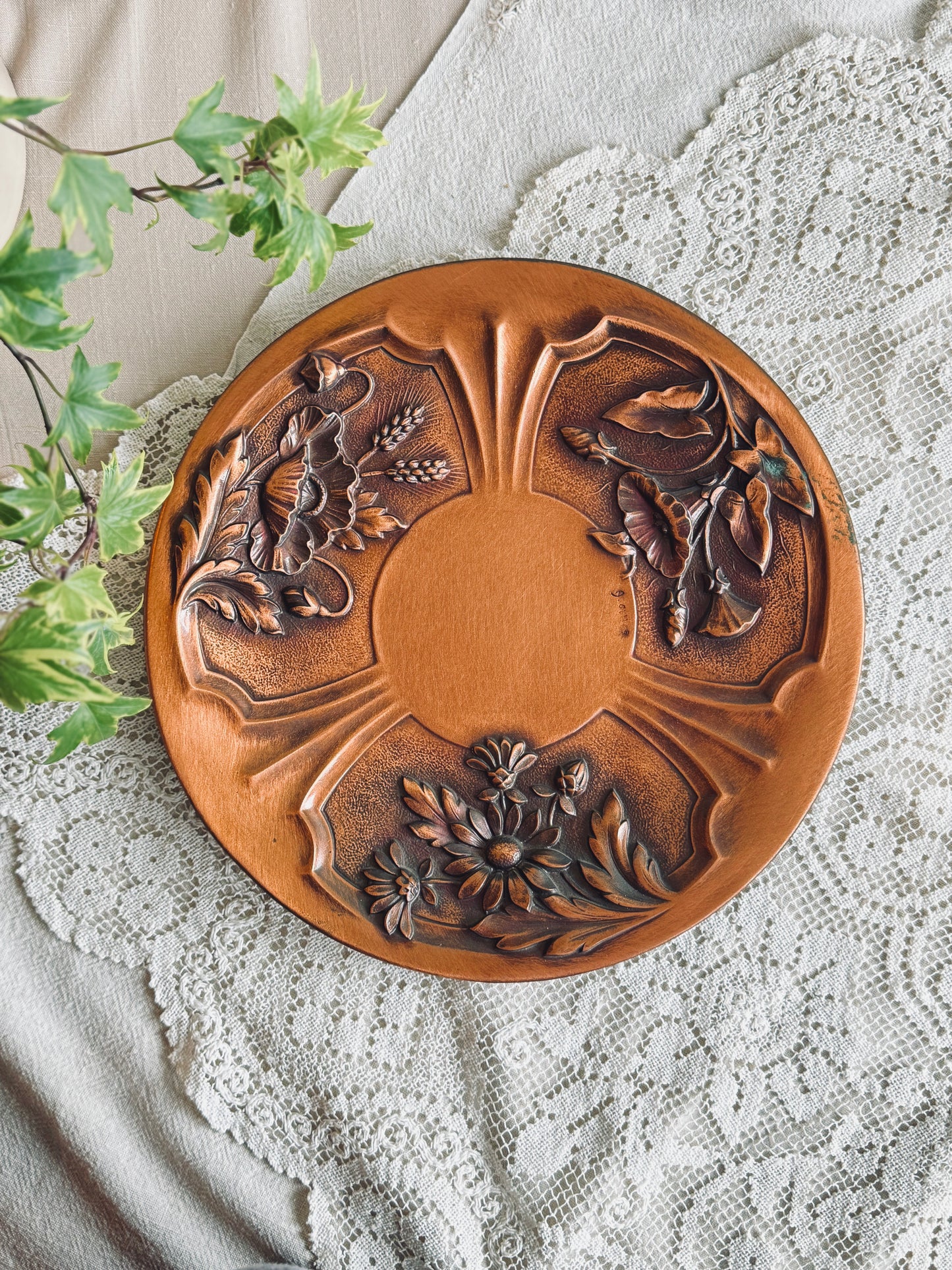 Large copper wall art with embossed florals