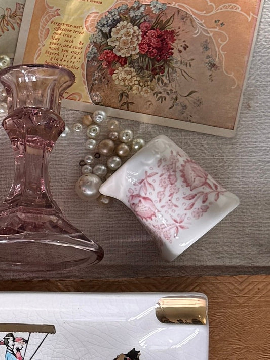 Dairy creamer with pink florals