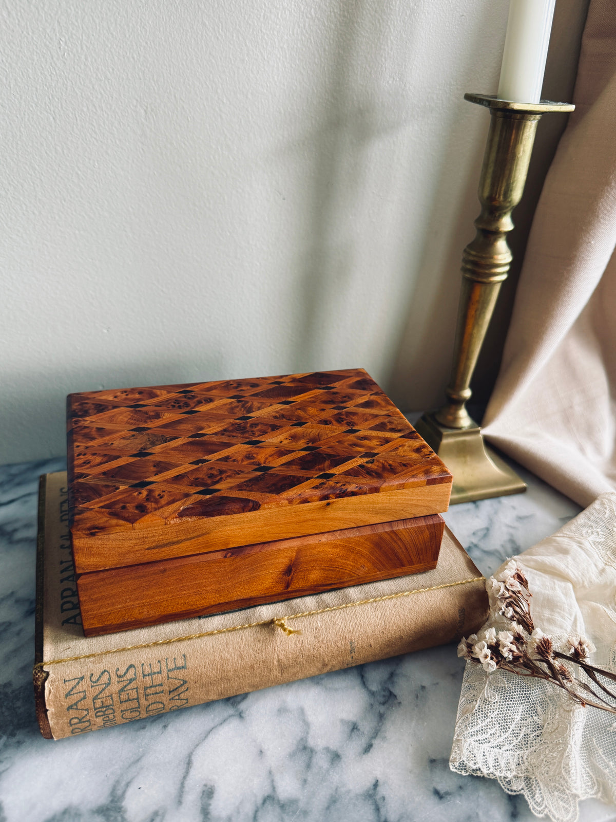 Handcrafted wooden burl wood box with intricate inlay lid