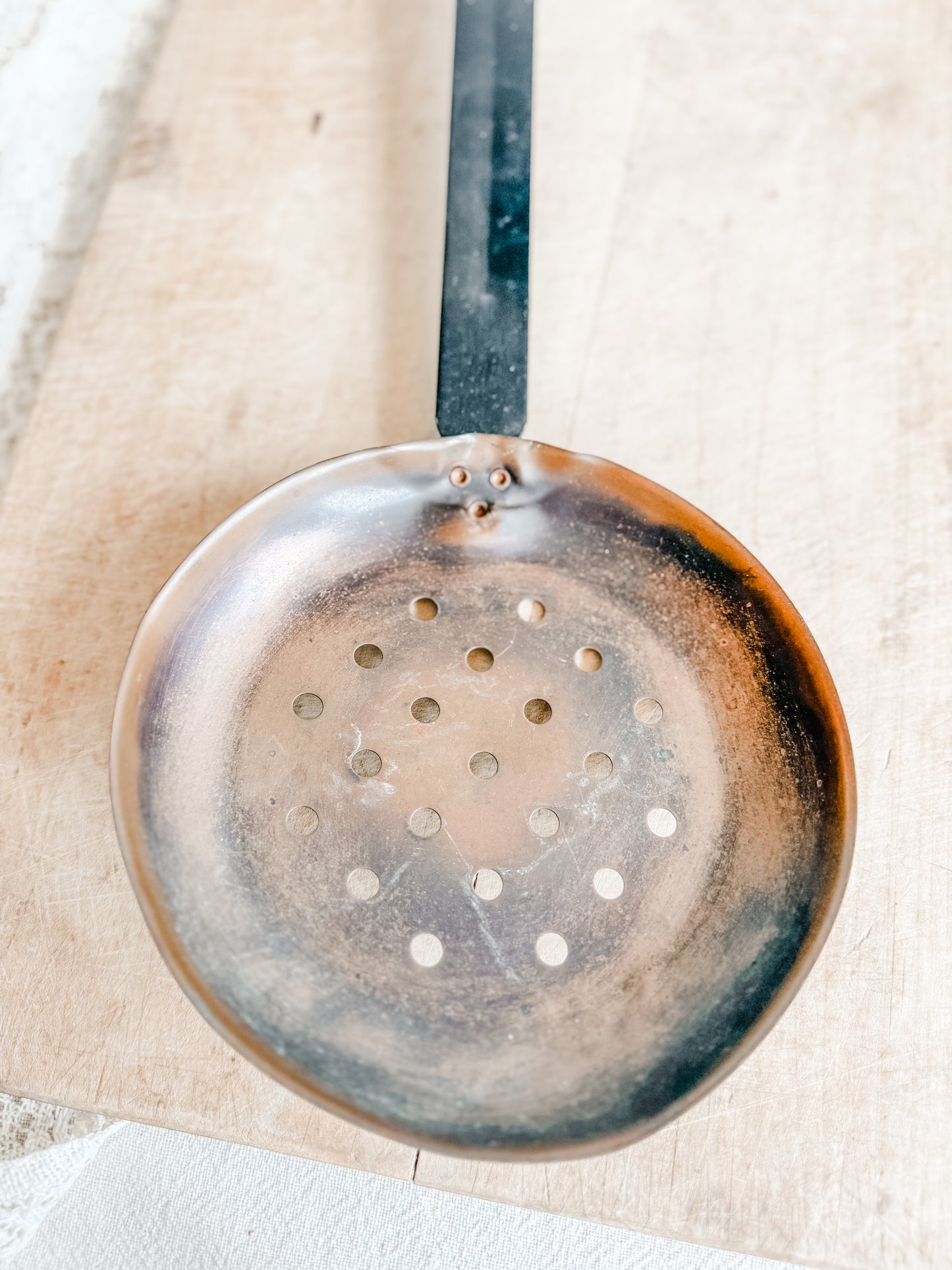 Wrought iron and copper skimmer or ladle