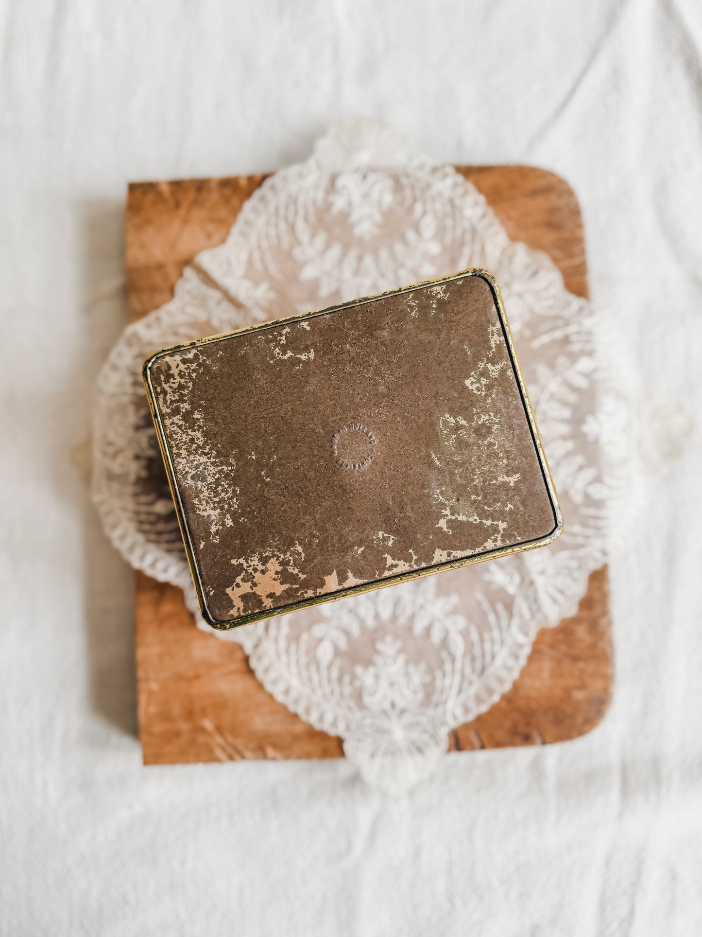Small floral tin