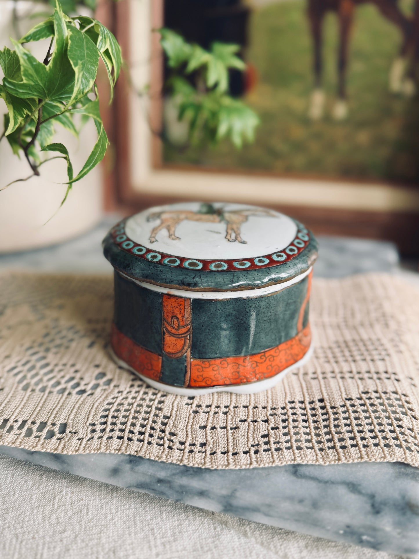 Porcelain Trinket box depicting a lady riding a horse