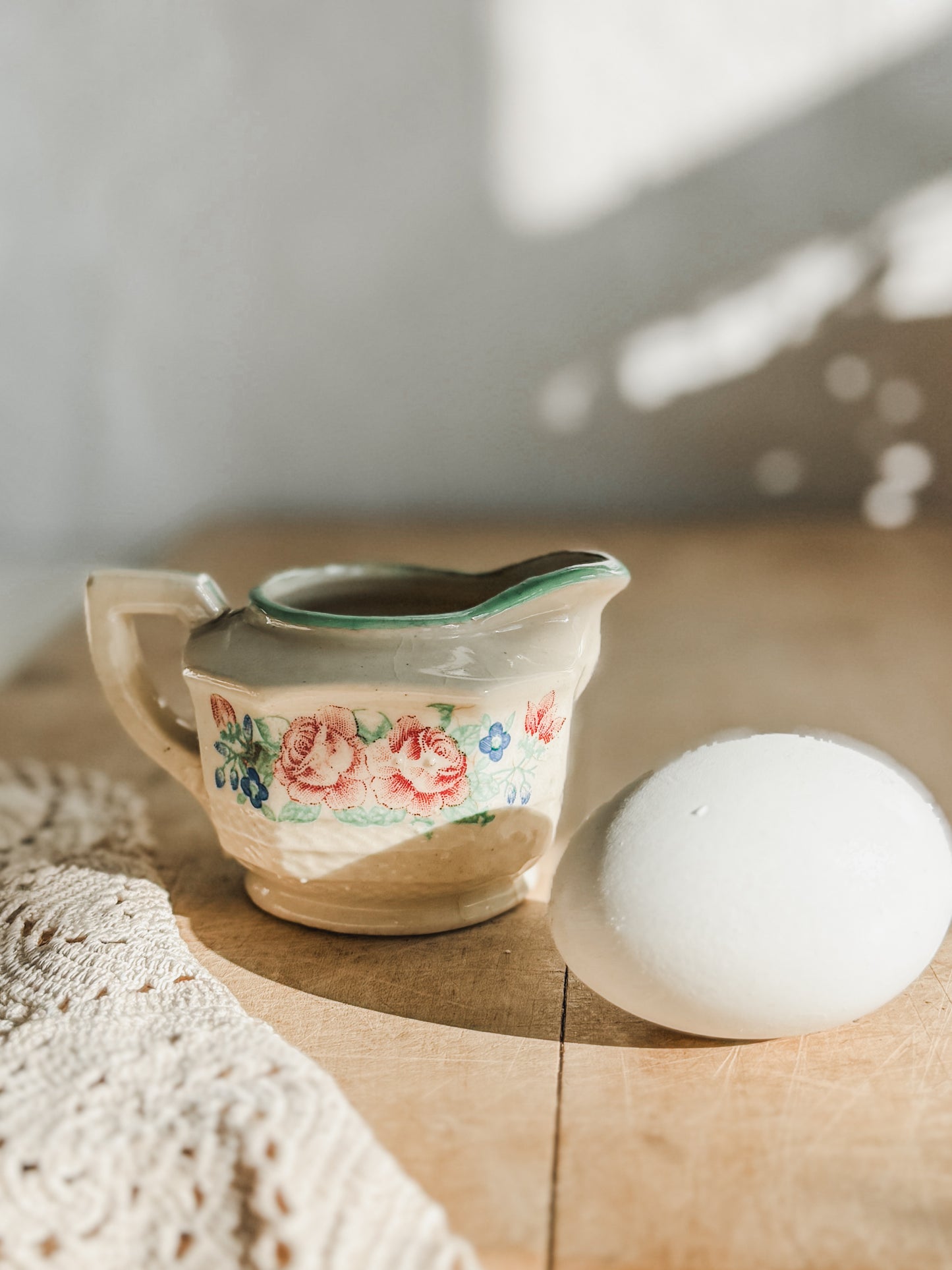 Small floral pitcher with green border