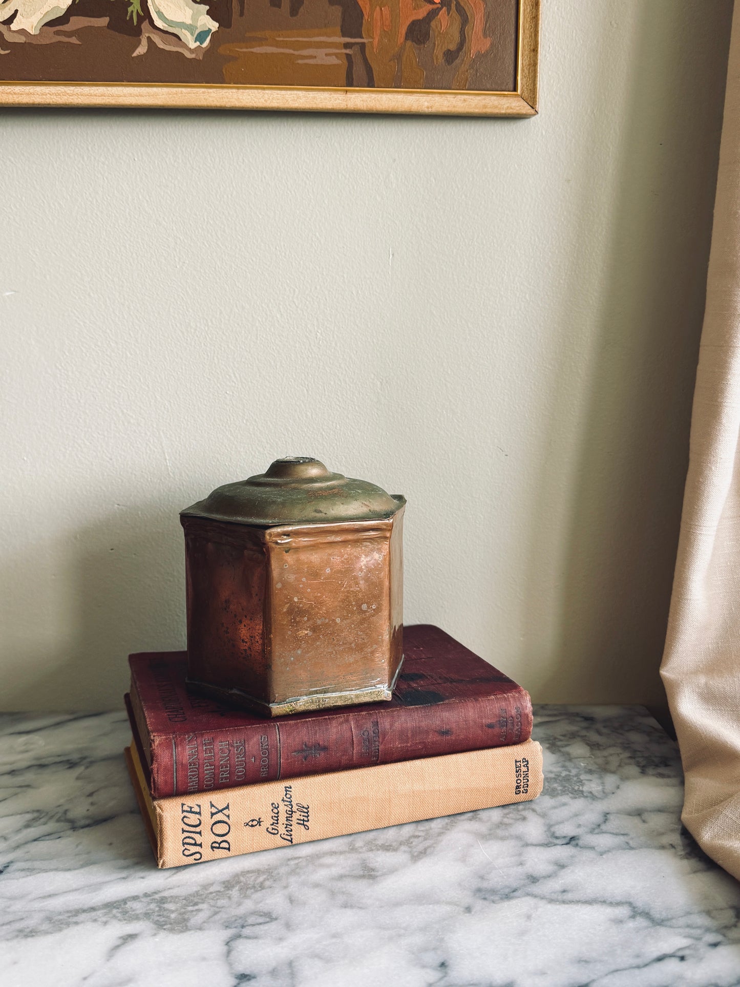 Lidded brass and copper canister