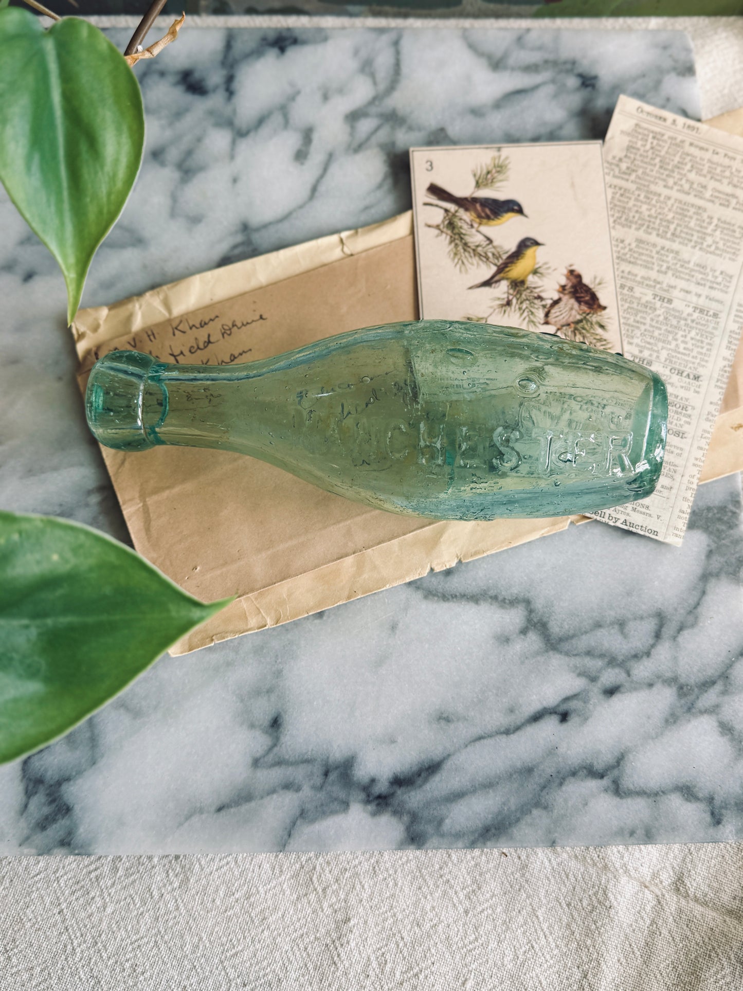 Antique aqua glass bottle