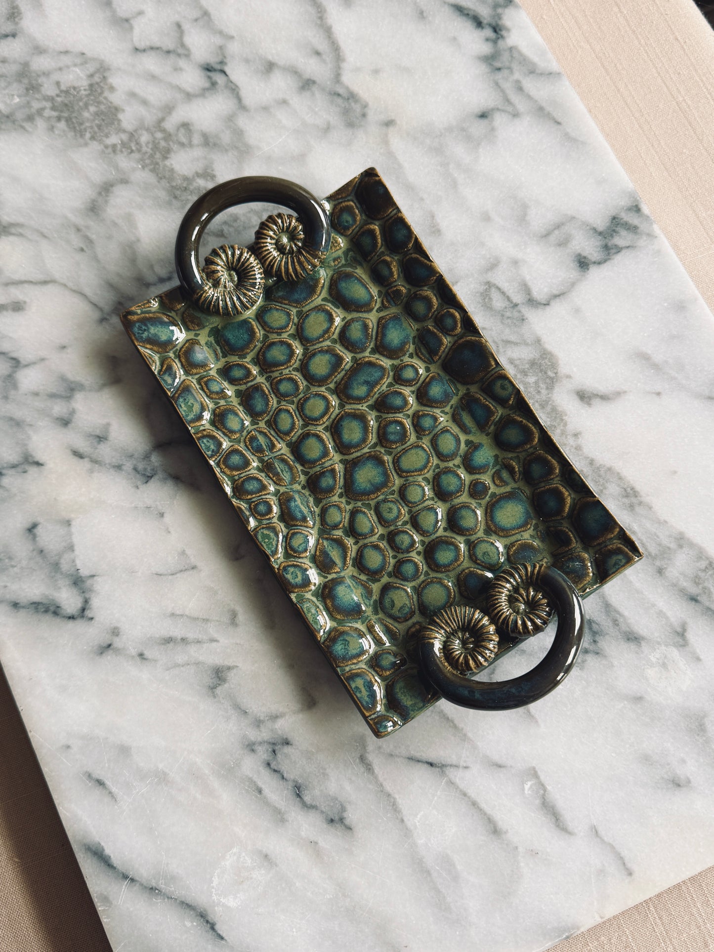 Studio pottery trinket tray with unique handles