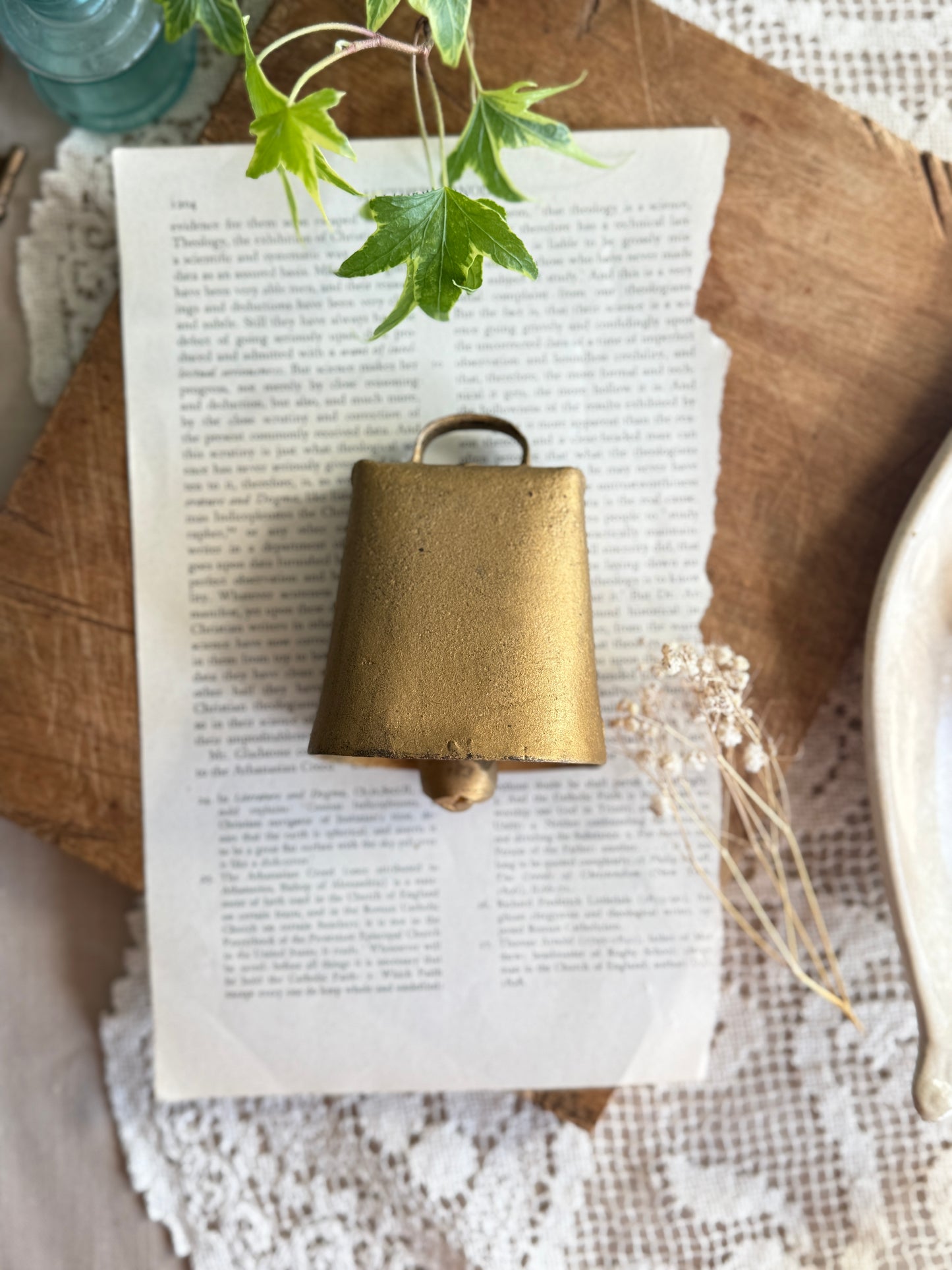 Rustic golden toned cow brass bell